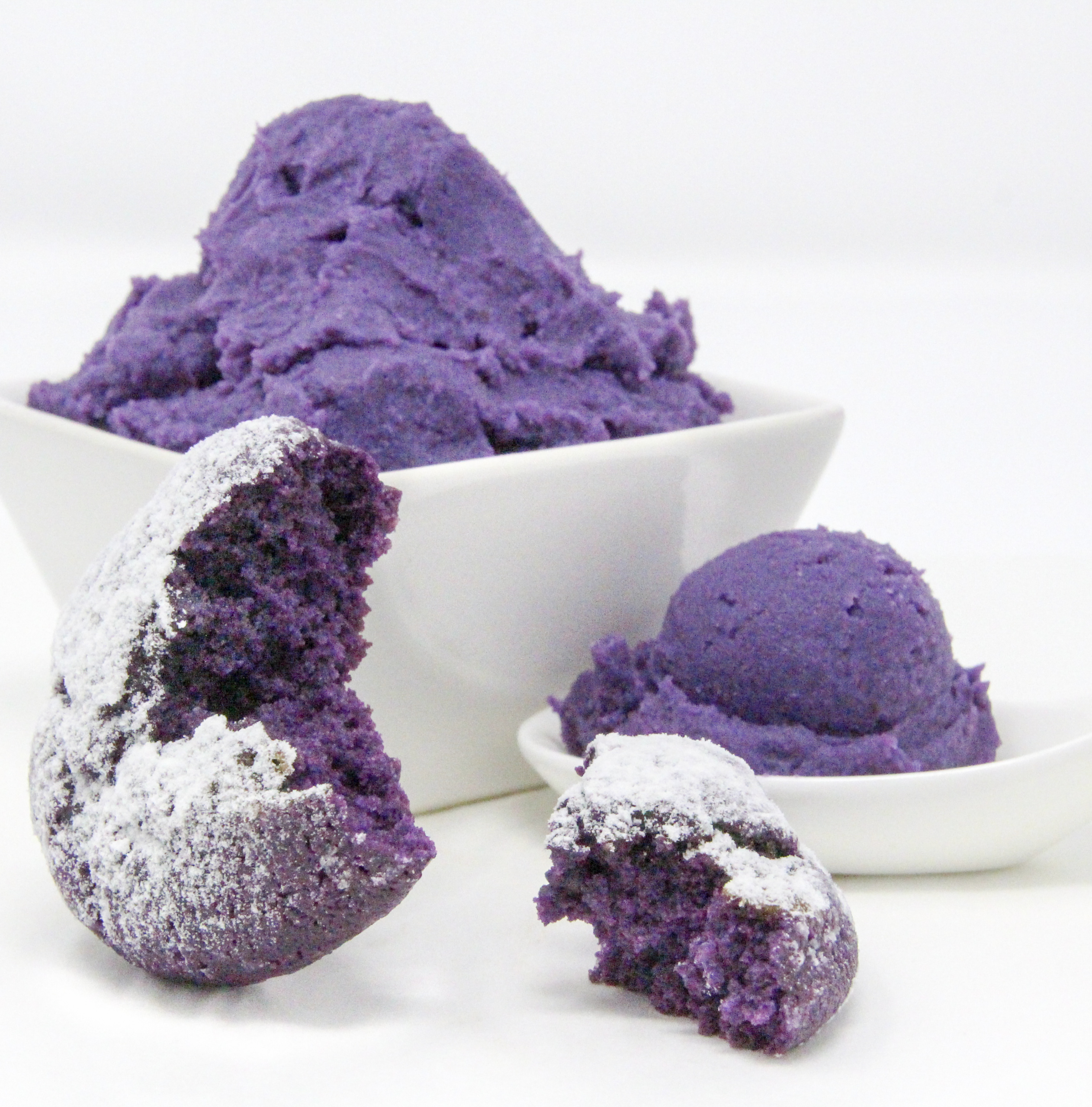 Traditional Filipino Ube Crinkles are delicious as they are unique and provide a welcome splash of color on any springtime cookie platter! Recipe shared with permission granted by Berkley Publishing, from cozy mystery ARSENIC AND ADOBO by Mia P. Manansala.