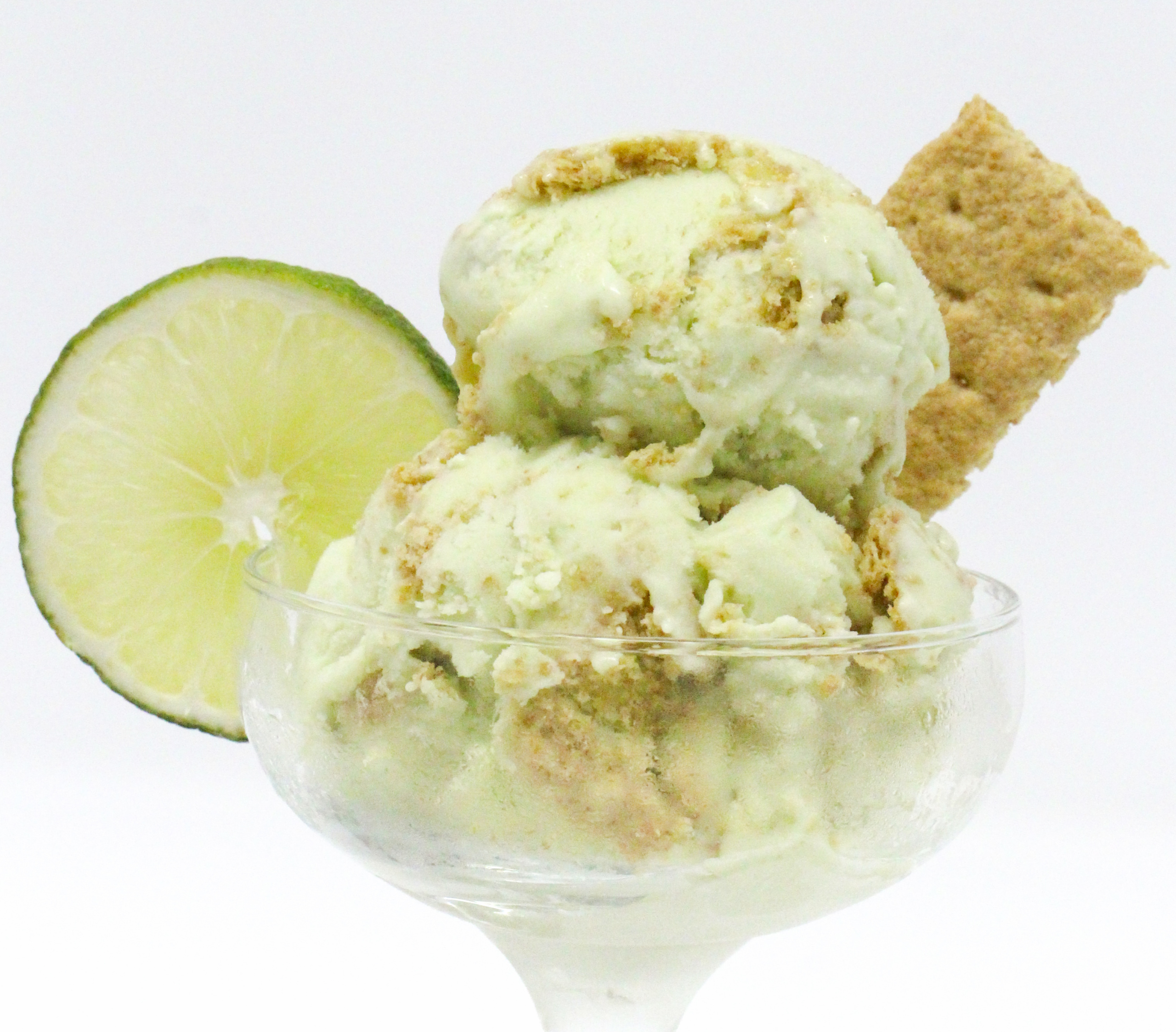 Trinidad’s Easy Key Lime Ice Cream is tangy yet sweet, while the bits of graham crackers add a delicious texture to the creamy custard base. Recipe shared with permission granted by Dana Mentink, author of PINT OF NO RETURN.