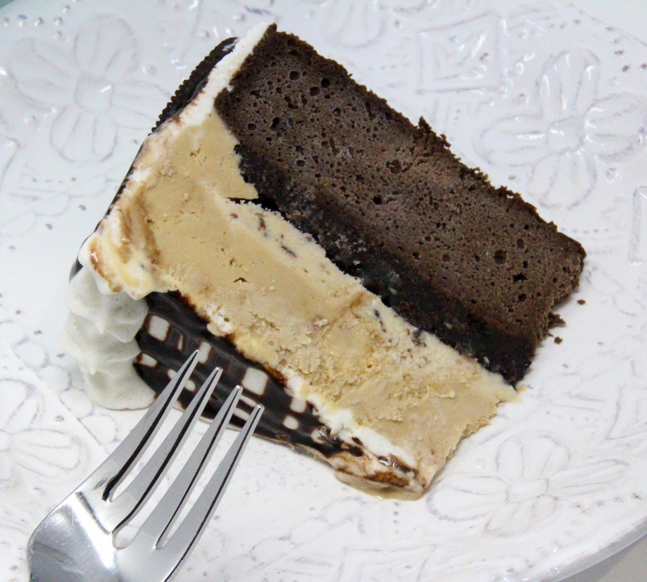 River's Ice Cream Cake is a delectable frozen treat that when served makes any occasion extra special. Using convenience products, it's easier to make than you might think. Recipe shared with permission granted by Maggie Toussaint, author of SHRIMPLY DEAD.