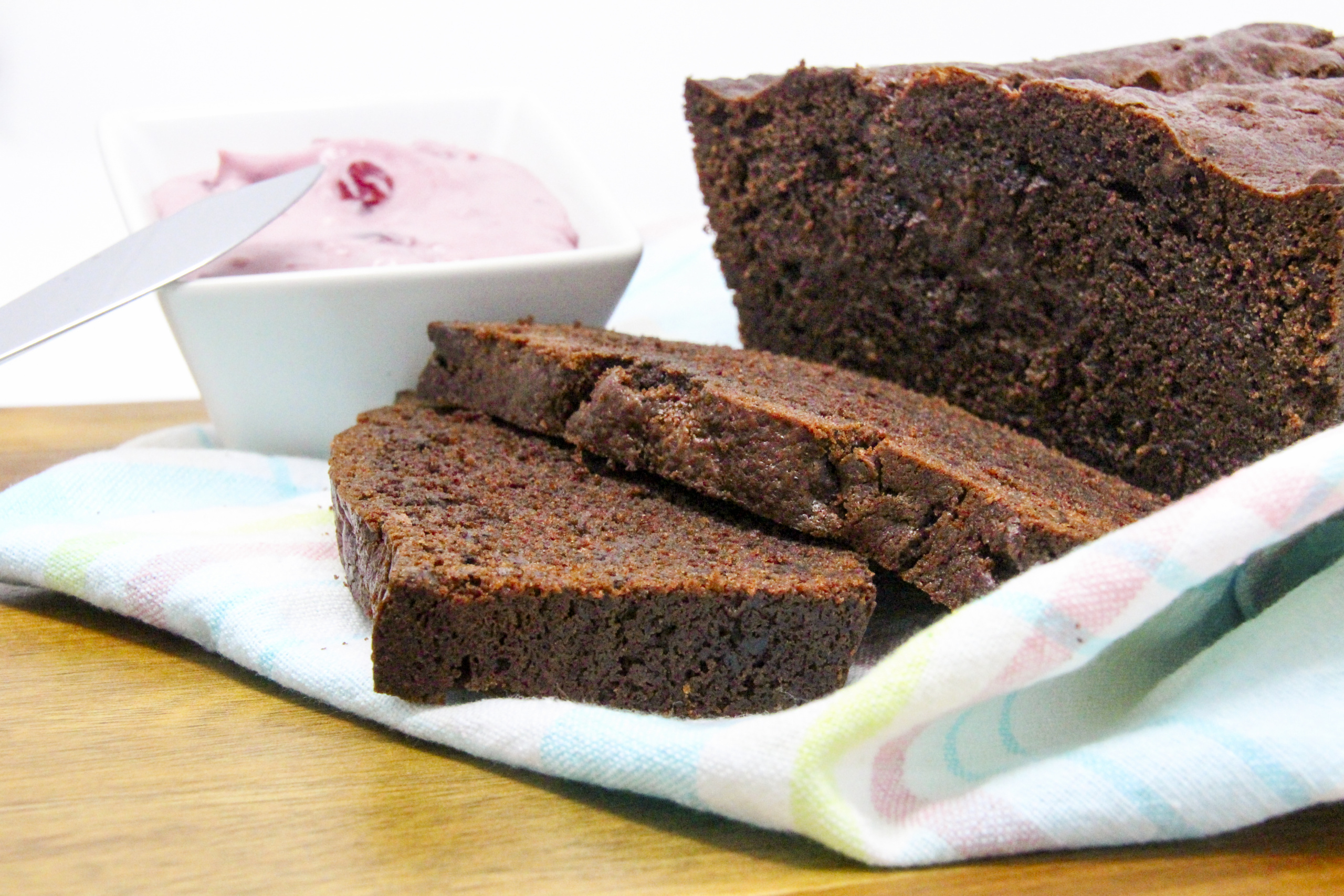 Super rich and super chocolaty, Gluten-Free Chocolate Loaf with Cherry Mascarpone Filling (or spread) ratcheted up the yum factor! A delectable treat for brunch, afternoon tea, or for anytime you feel like spoiling yourself! Recipe shared with permission granted by Libby Klein, author of BEAUTY EXPOS ARE MURDER.