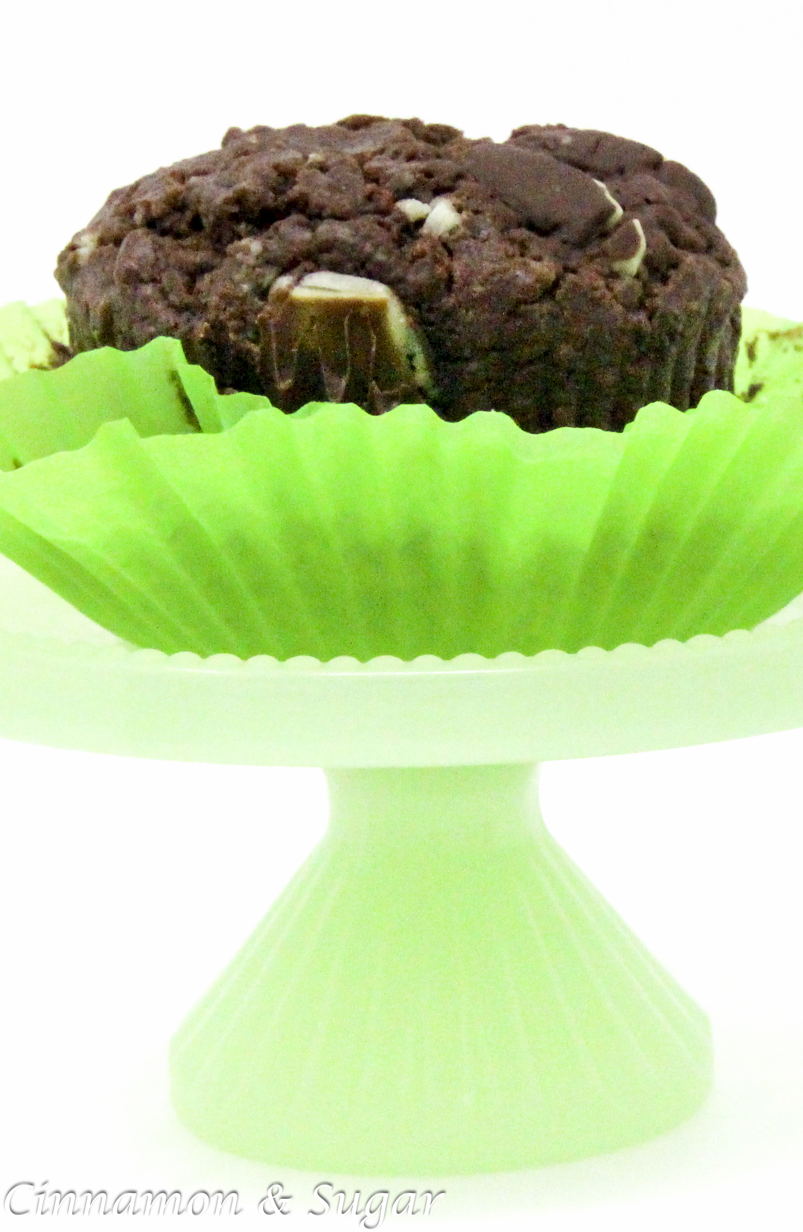 With a generous portion of of both cocoa powder and Andes Chocolate Mints, these rich Chocolate Mint Muffins could very well be classified as dessert cupcakes since they're so scrumptious! Recipe shared with permission granted by Daryl Wood Gerber, author of WINING AND DYING.