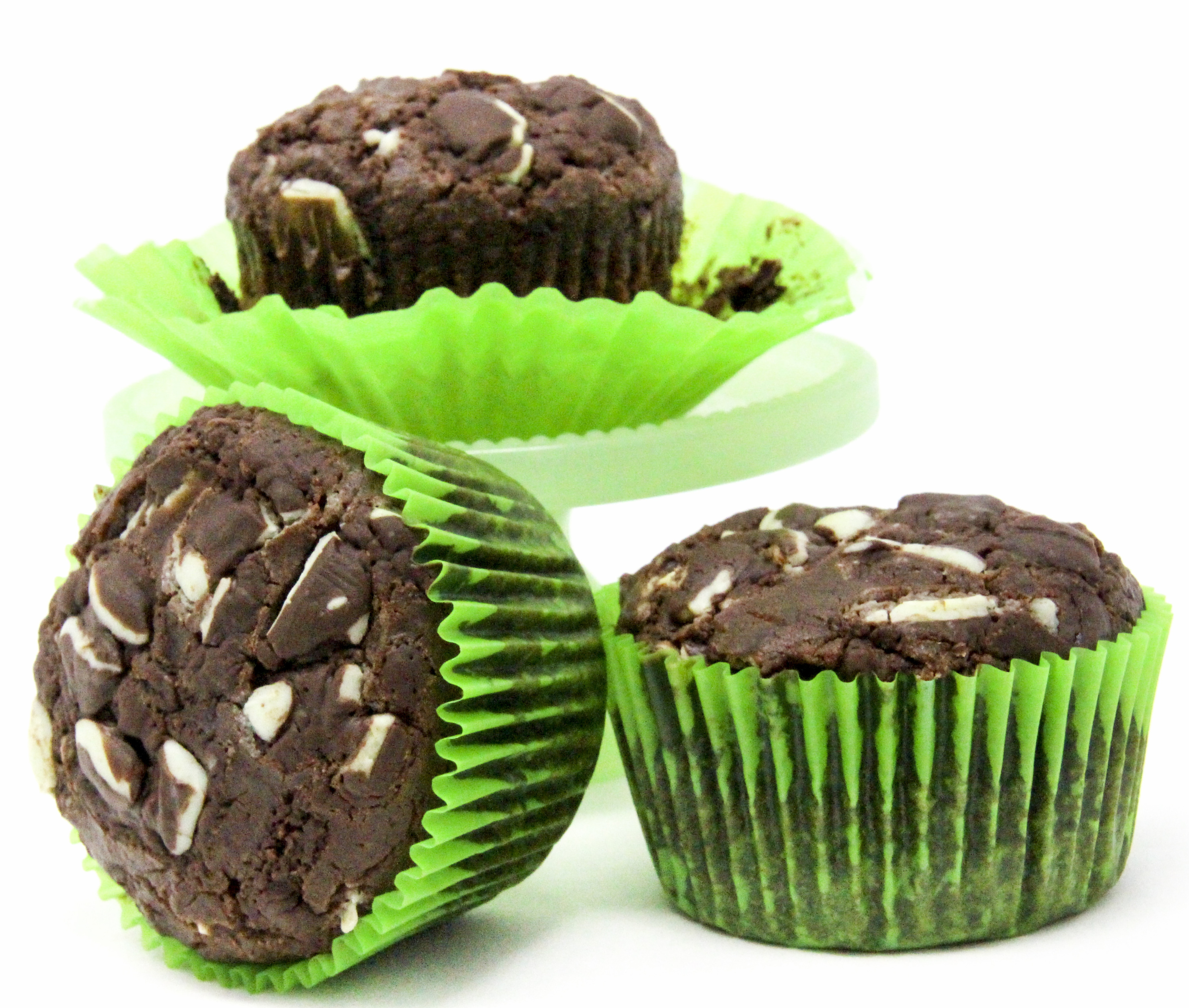 With a generous portion of of both cocoa powder and Andes Chocolate Mints, these rich Chocolate Mint Muffins could very well be classified as dessert cupcakes since they're so scrumptious! Recipe shared with permission granted by Daryl Wood Gerber, author of WINING AND DYING.