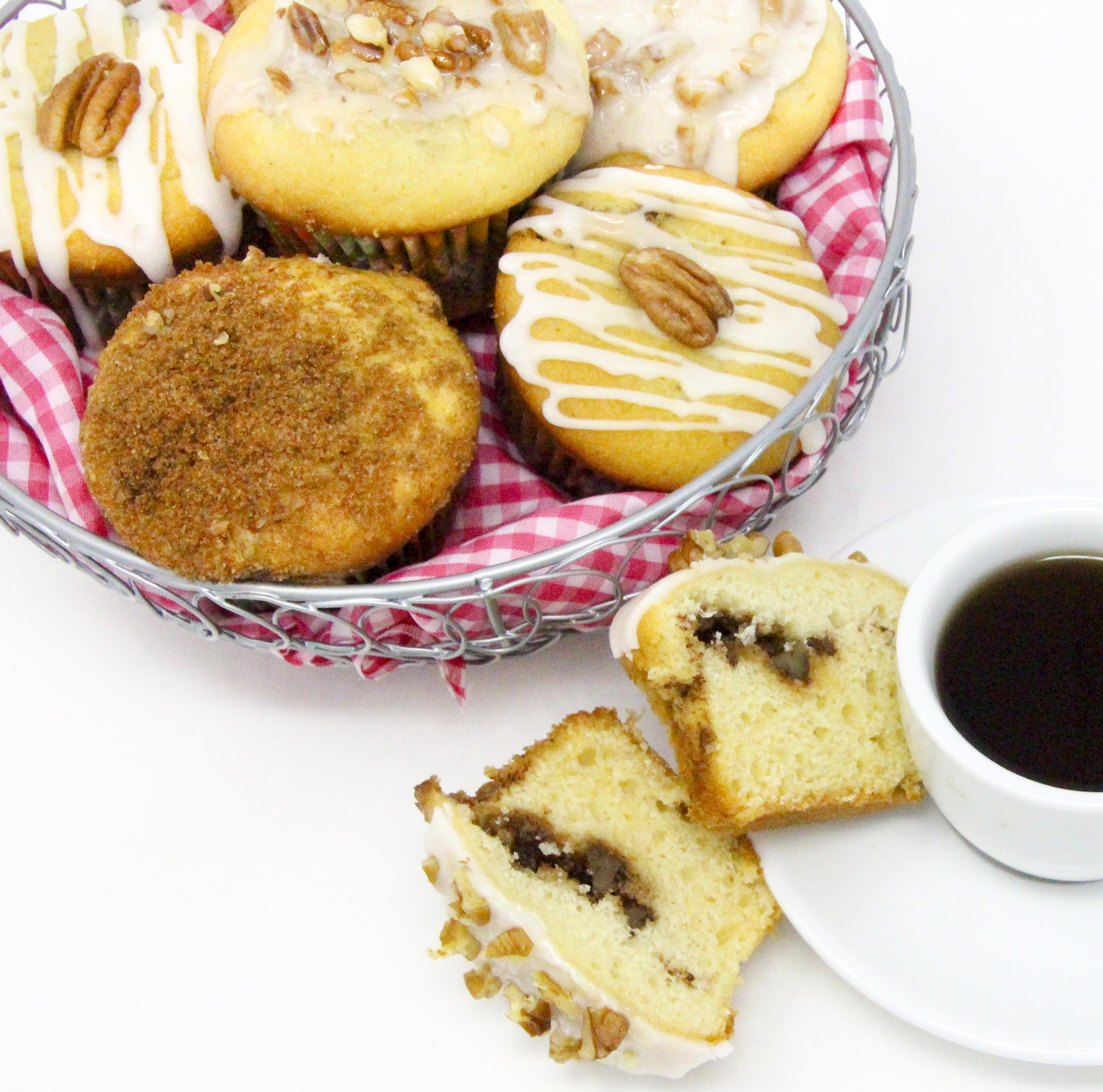 Sour Cream Pecan Coffee Cake Muffins are rich and tender, thanks to a generous amount of sour cream, while the addition of brown sugar, cinnamon, and pecans layered in the center of the muffins make these extra delicious. Recipe shared with permission granted by S.C. Perkins, author of FATAL FAMILY TIES.