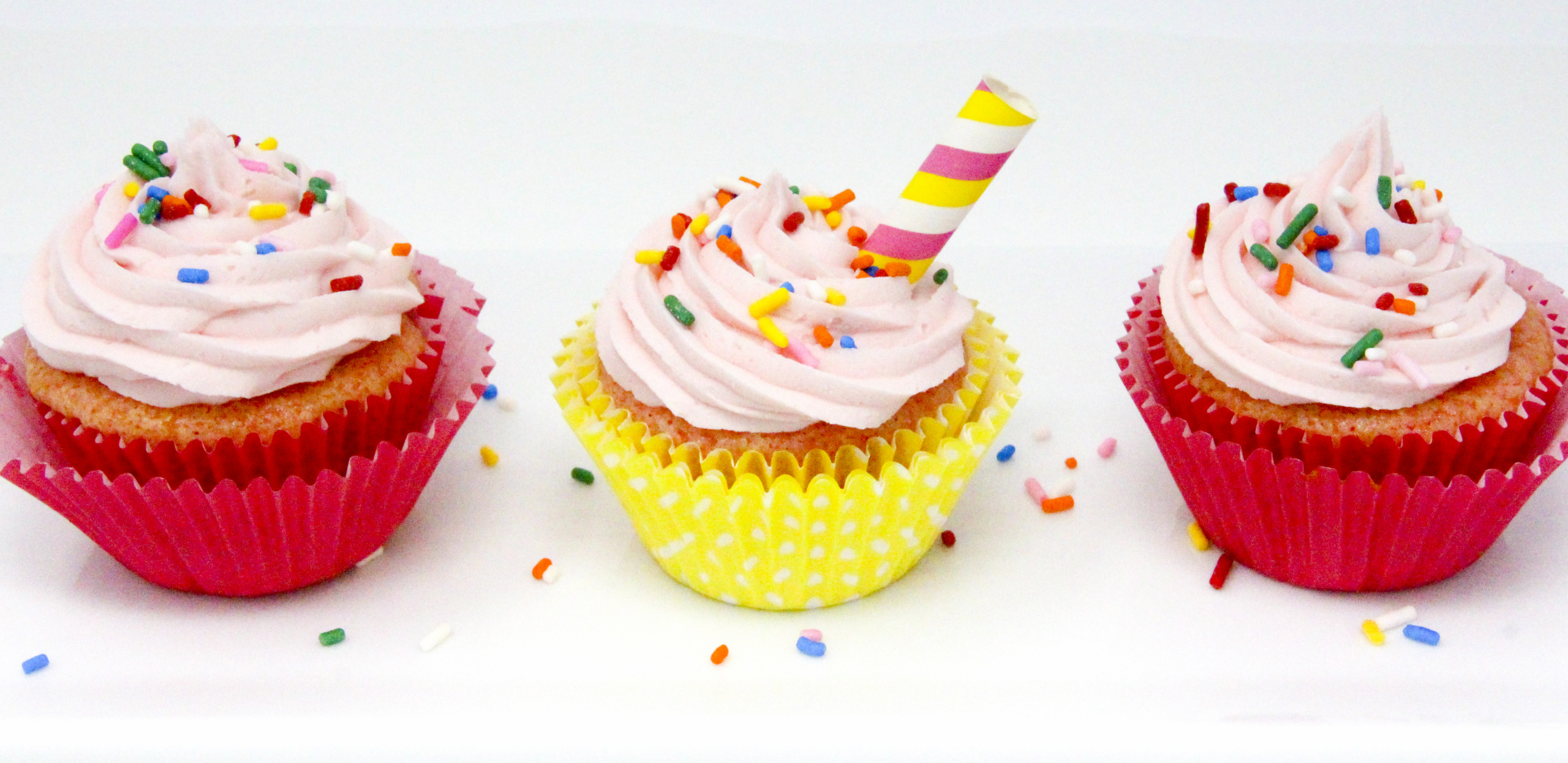 Pink Lemonade Cupcakes starts with the convenience of a boxed mix but with the addition of frozen pink lemonade, the summertime flavor shines in these tasty treats! Recipe from FRAMED AND FROSTED by Kim Davis.