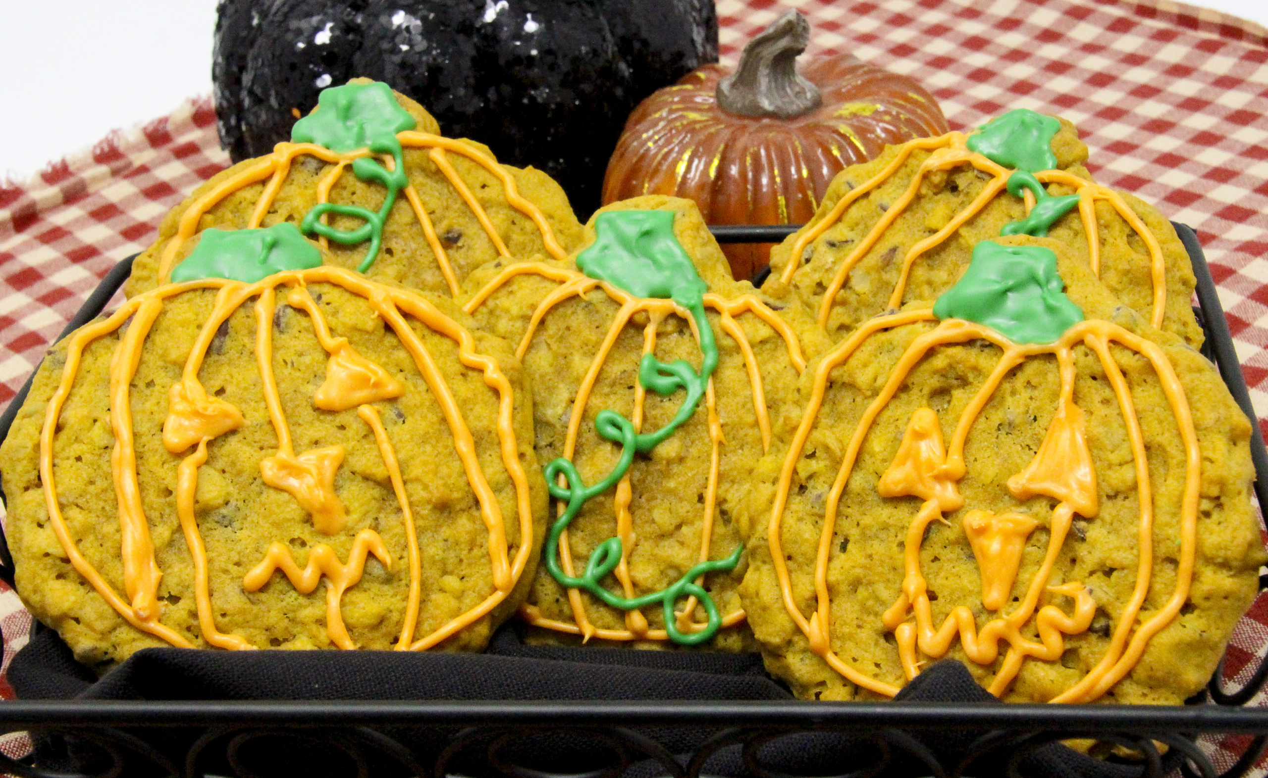 Full of flavor, these Gluten-Free Pumpkin cookies are pumpkiny and spicy, chocolately and cakey, yet moist with a crunch from the walnuts added. Recipe shared with permission granted by Barbara Ross, author of Halloween Party Murder.