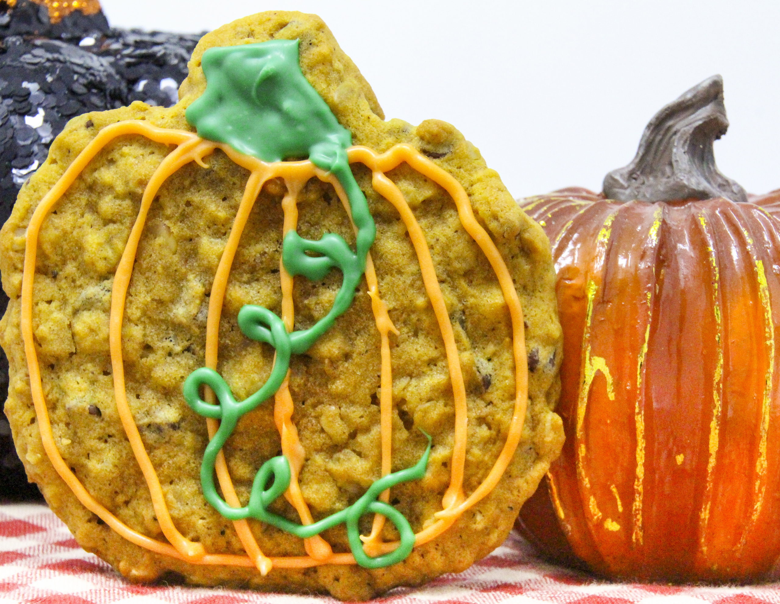 Full of flavor, these Gluten-Free Pumpkin cookies are pumpkiny and spicy, chocolately and cakey, yet moist with a crunch from the walnuts added. Recipe shared with permission granted by Barbara Ross, author of Halloween Party Murder.