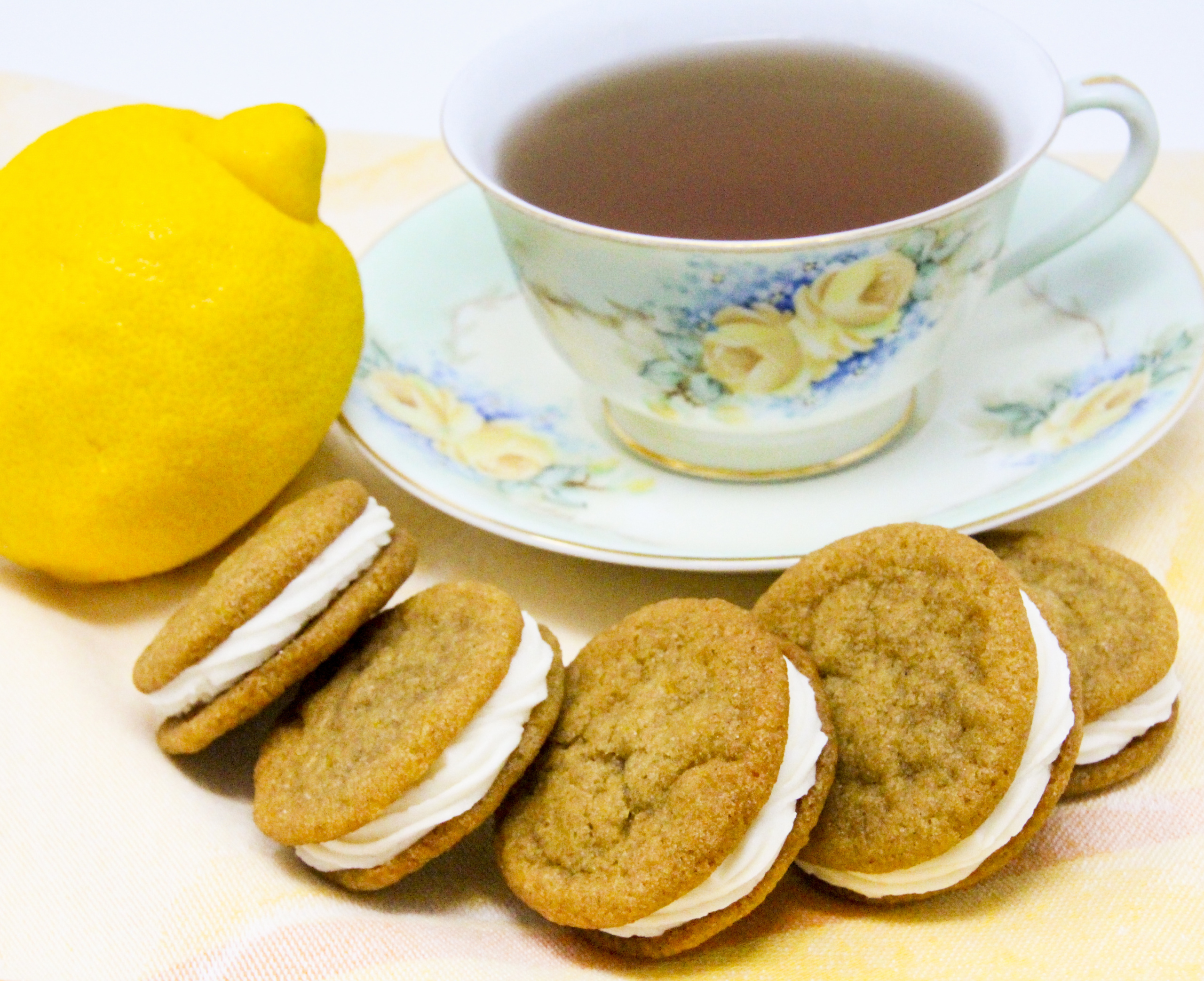 Chockful of flavor, these Lemon-Ginger Sandwich Cookies are a bit crunchy on the edges and soft and sweet on the insides. Perfection in each bite! Recipe shared with permission granted by Darci Hannah, author of MURDER AT THE CHRISTMAS COOKIE BAKE-OFF.