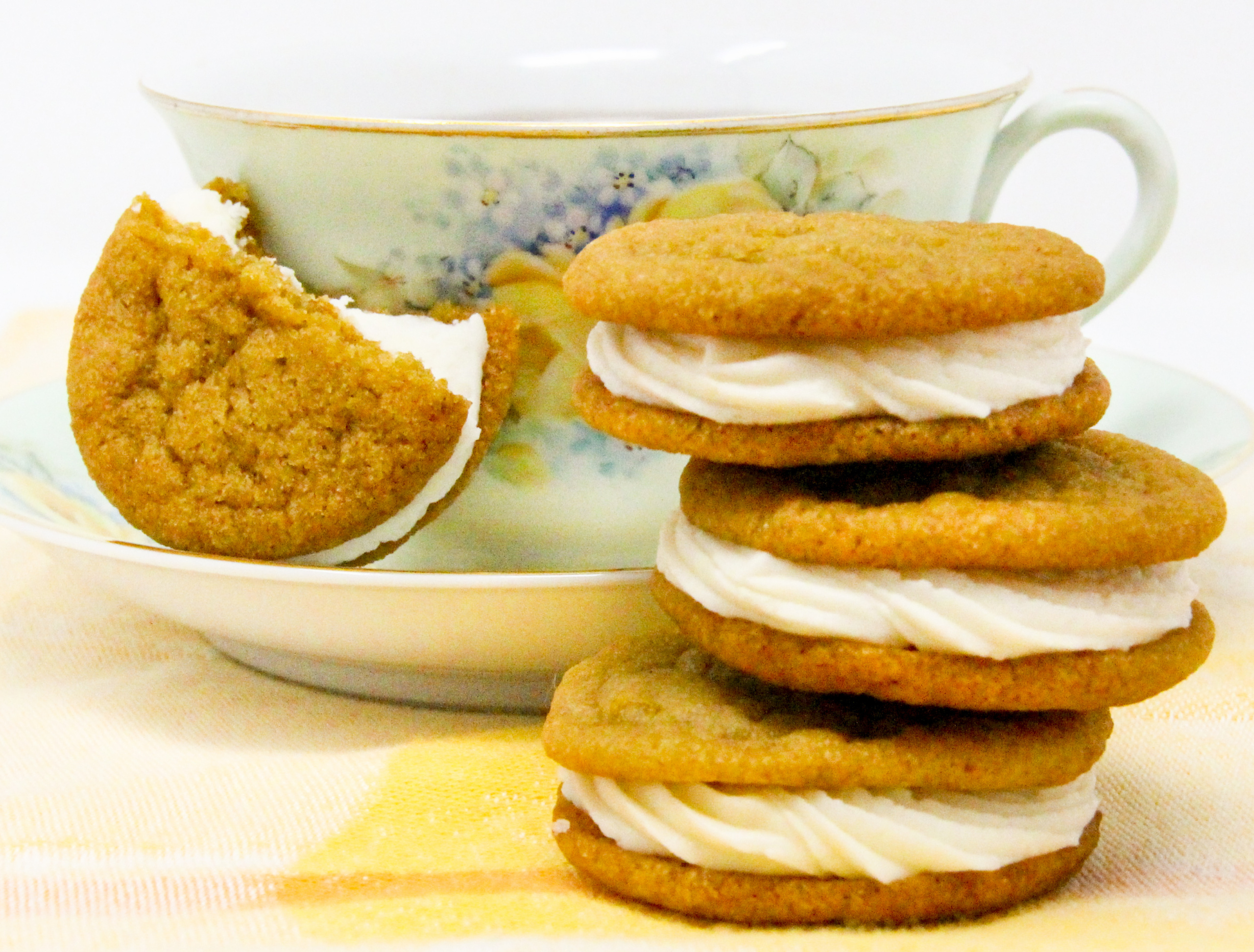 Chockful of flavor, these Lemon-Ginger Sandwich Cookies are a bit crunchy on the edges and soft and sweet on the insides. Perfection in each bite! Recipe shared with permission granted by Darci Hannah, author of MURDER AT THE CHRISTMAS COOKIE BAKE-OFF.