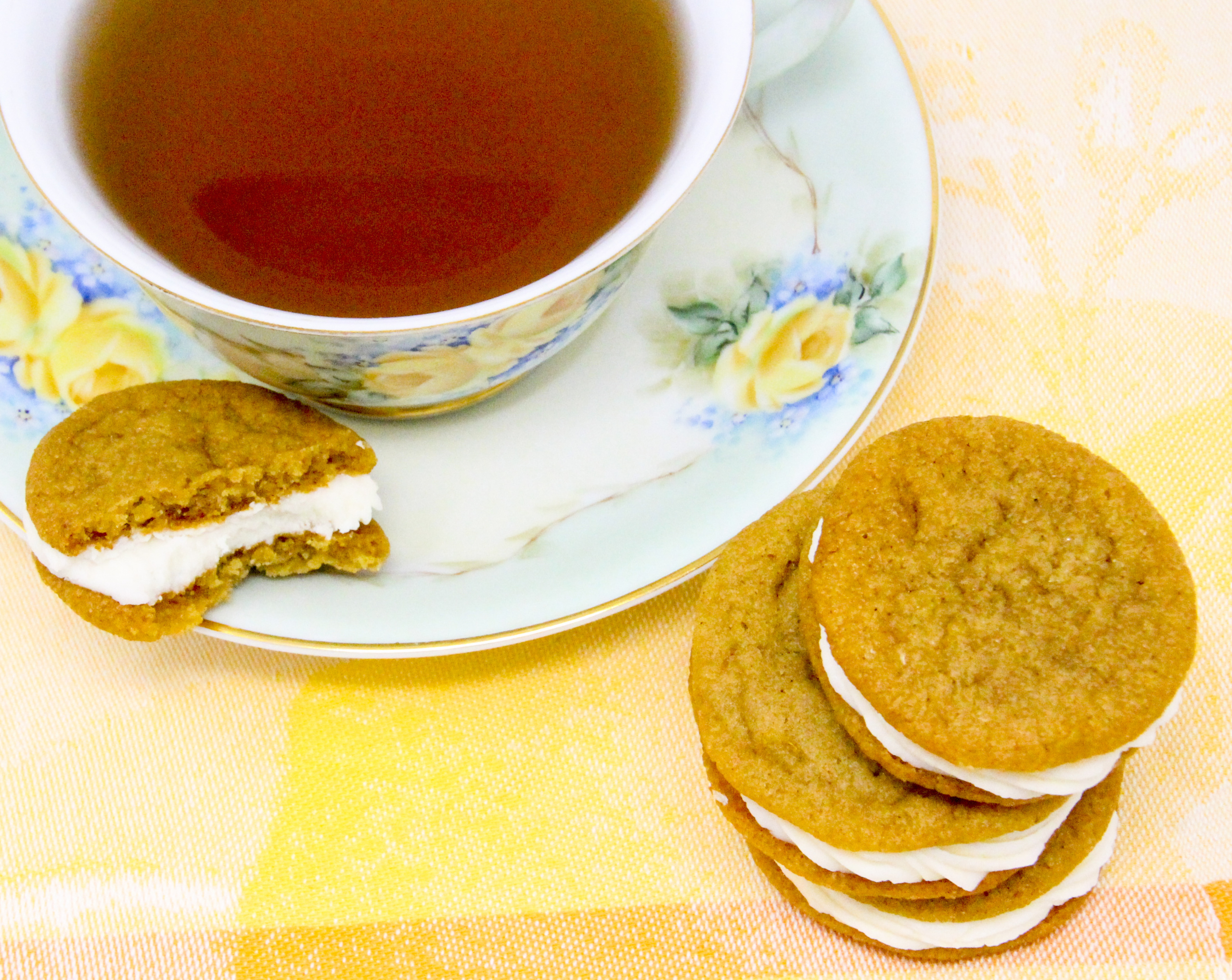 Chockful of flavor, these Lemon-Ginger Sandwich Cookies are a bit crunchy on the edges and soft and sweet on the insides. Perfection in each bite! Recipe shared with permission granted by Darci Hannah, author of MURDER AT THE CHRISTMAS COOKIE BAKE-OFF.