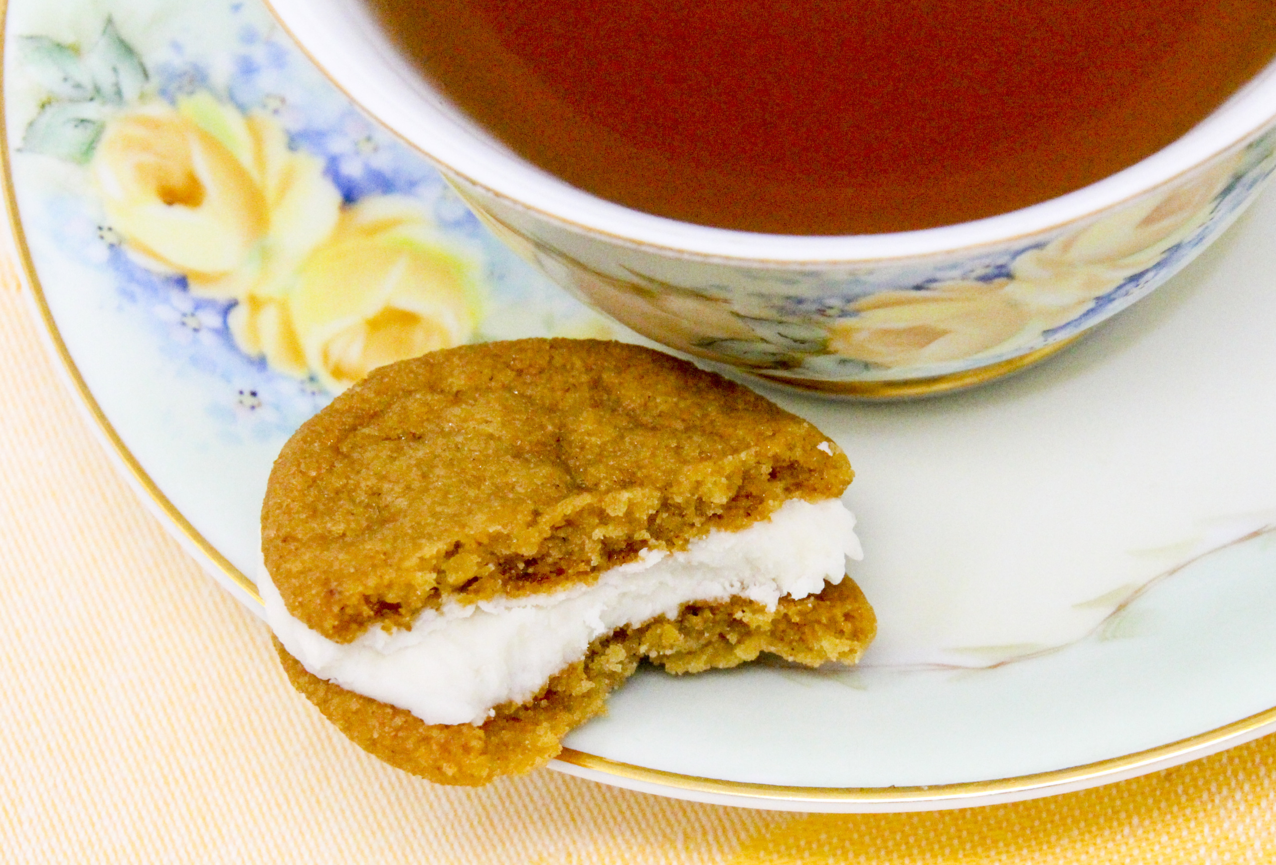 Chockful of flavor, these Lemon-Ginger Sandwich Cookies are a bit crunchy on the edges and soft and sweet on the insides. Perfection in each bite! Recipe shared with permission granted by Darci Hannah, author of MURDER AT THE CHRISTMAS COOKIE BAKE-OFF.