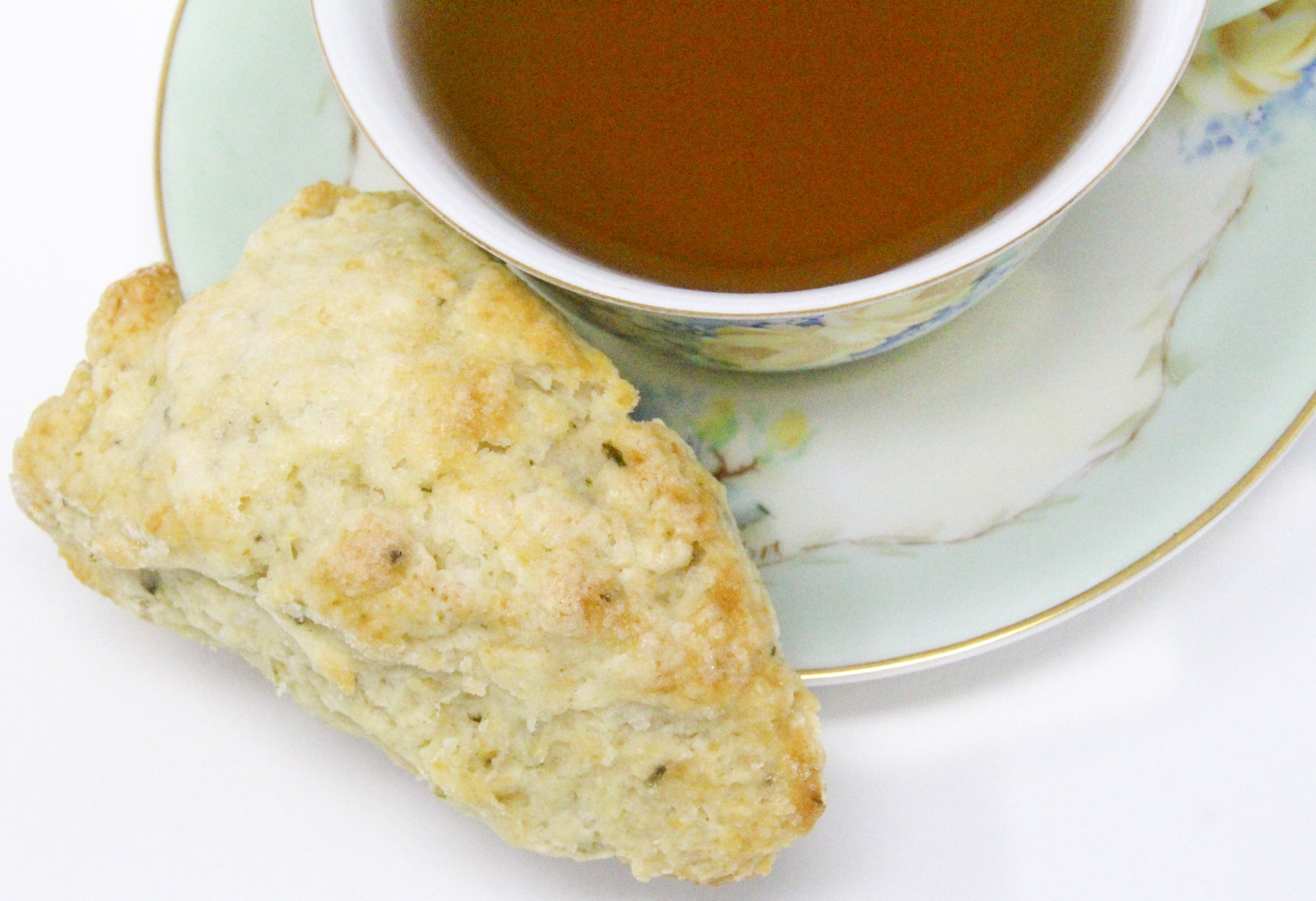 Flaky and rich, these scones contained just the right amount of rosemary while the lemon complemented and tempered the flavor. Recipe shared with permission granted by Maddie Day, author of NO GRATER CRIME.