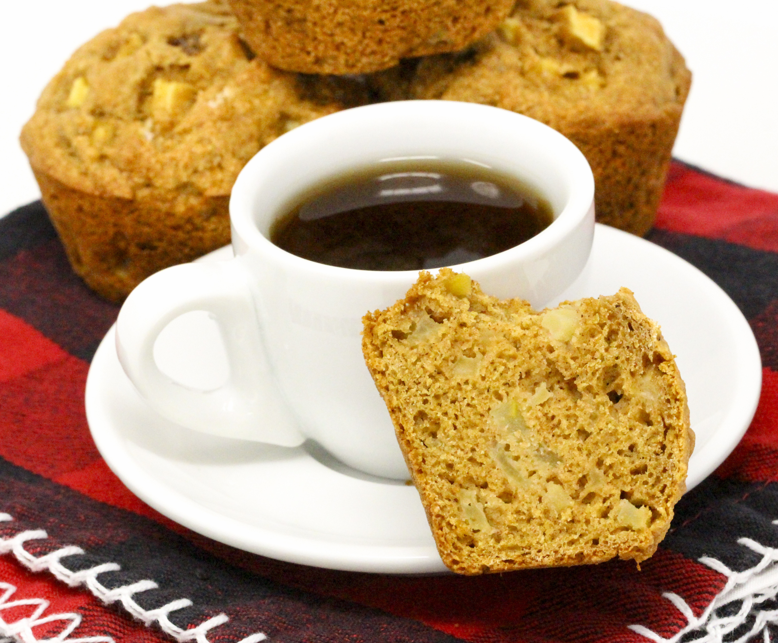 Cinnamon and nutmeg provides warming flavors while apples add a nice moistness to complement the 100% whole wheat flour Apple Spice Muffins. Recipe shared with permission granted by Maddie Day, author of MURDER AT THE LOBSTAH SHACK.