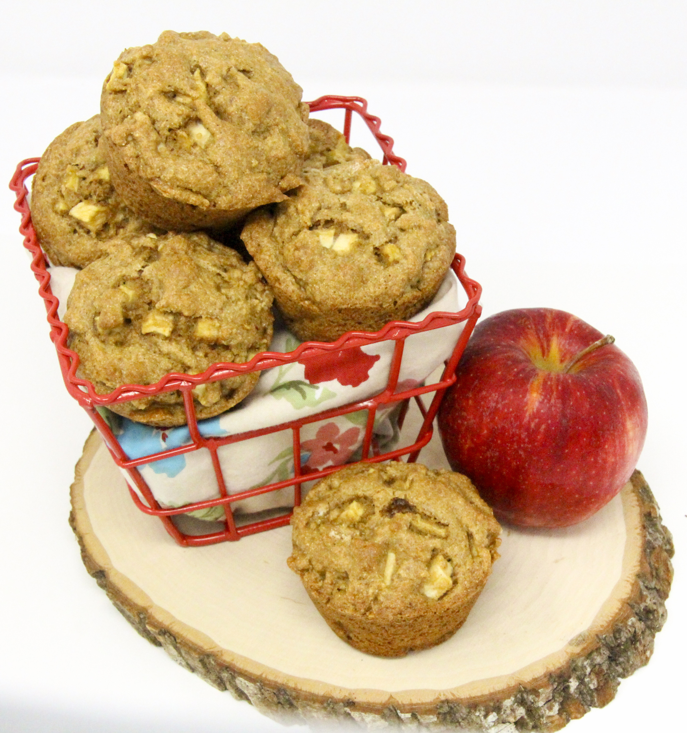 Cinnamon and nutmeg provides warming flavors while apples add a nice moistness to complement the 100% whole wheat flour Apple Spice Muffins. Recipe shared with permission granted by Maddie Day, author of MURDER AT THE LOBSTAH SHACK.