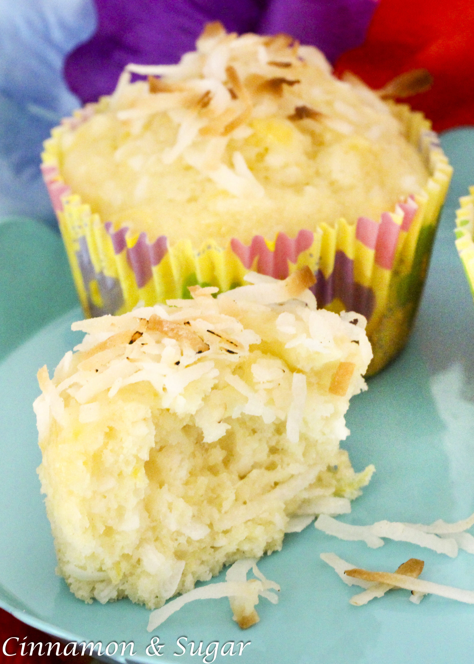 Tropical Pineapple Muffins are moist and flavorful thanks to the generous amount of pineapple. These muffins will have you dreaming of sunny days and tropical isles on chilly winter mornings! Recipe shared with permission granted by Kim Davis, contributing author for The Secret Ingredient: The Mystery Writers' Cookbook.