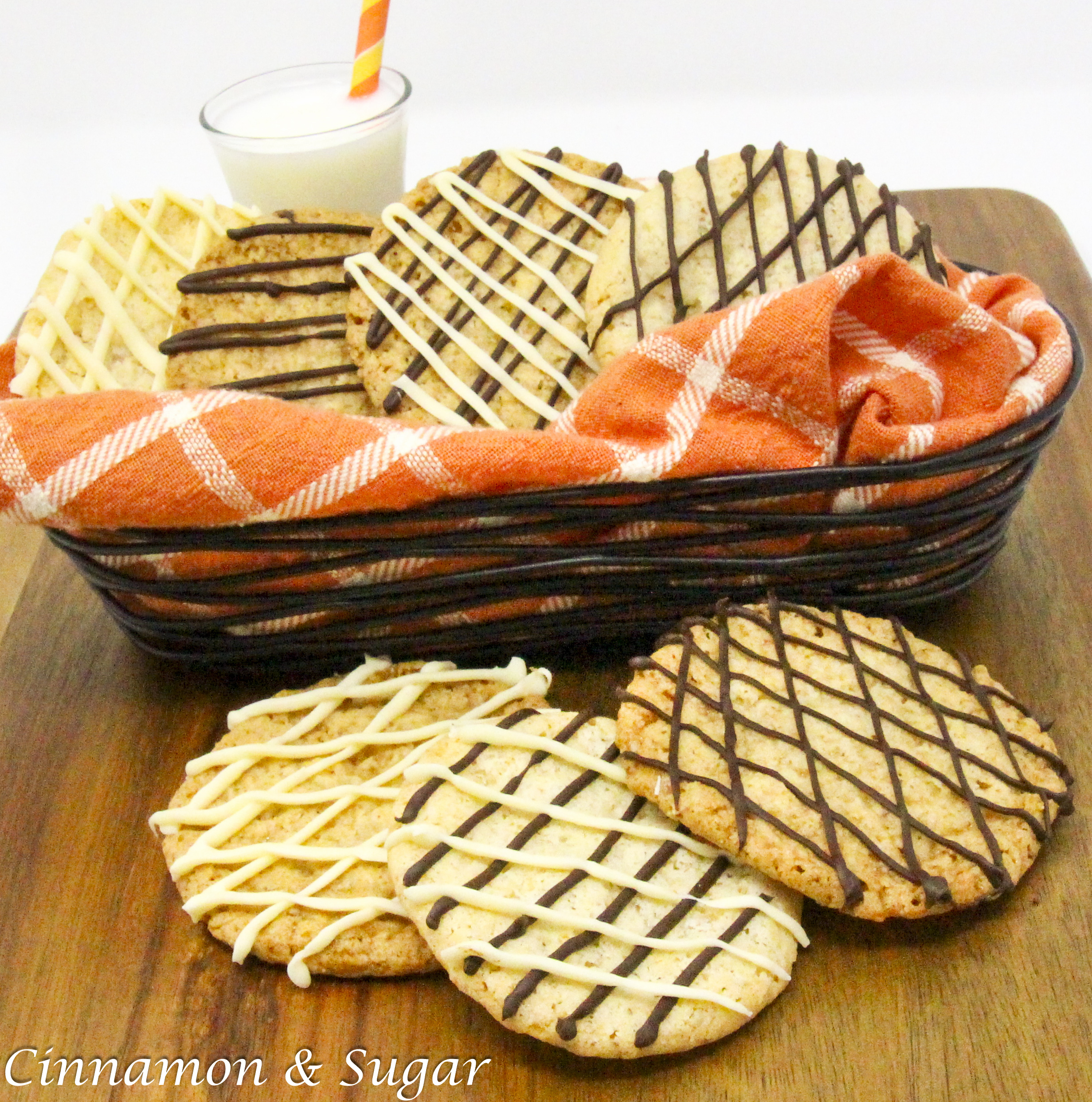 Thin and crispy on the edges, yet a bit chewy on the inside, these Lacy Oatmeal Cookies with chocolate drizzle makes a simple cookie irresistible. Recipe from FROSTED YULETIDE MURDER by Kim Davis. 