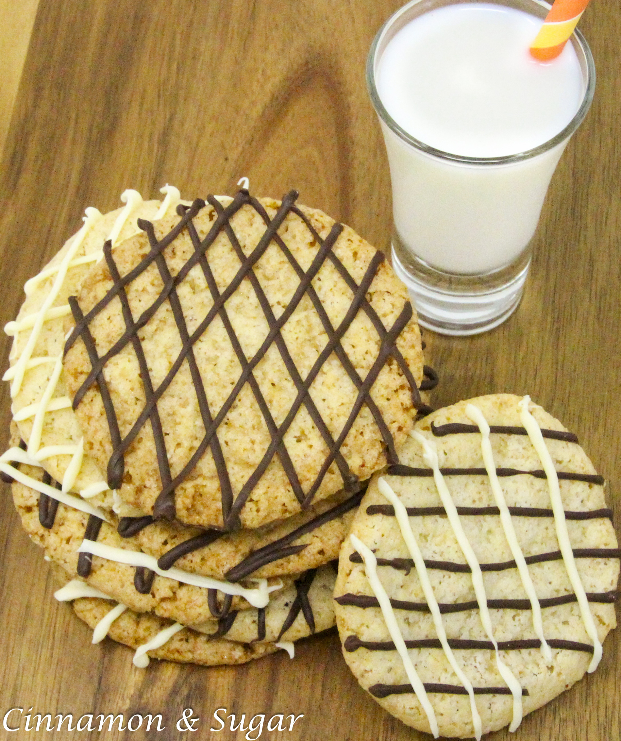 Thin and crispy on the edges, yet a bit chewy on the inside, these Lacy Oatmeal Cookies with chocolate drizzle makes a simple cookie irresistible. Recipe from FROSTED YULETIDE MURDER by Kim Davis. 