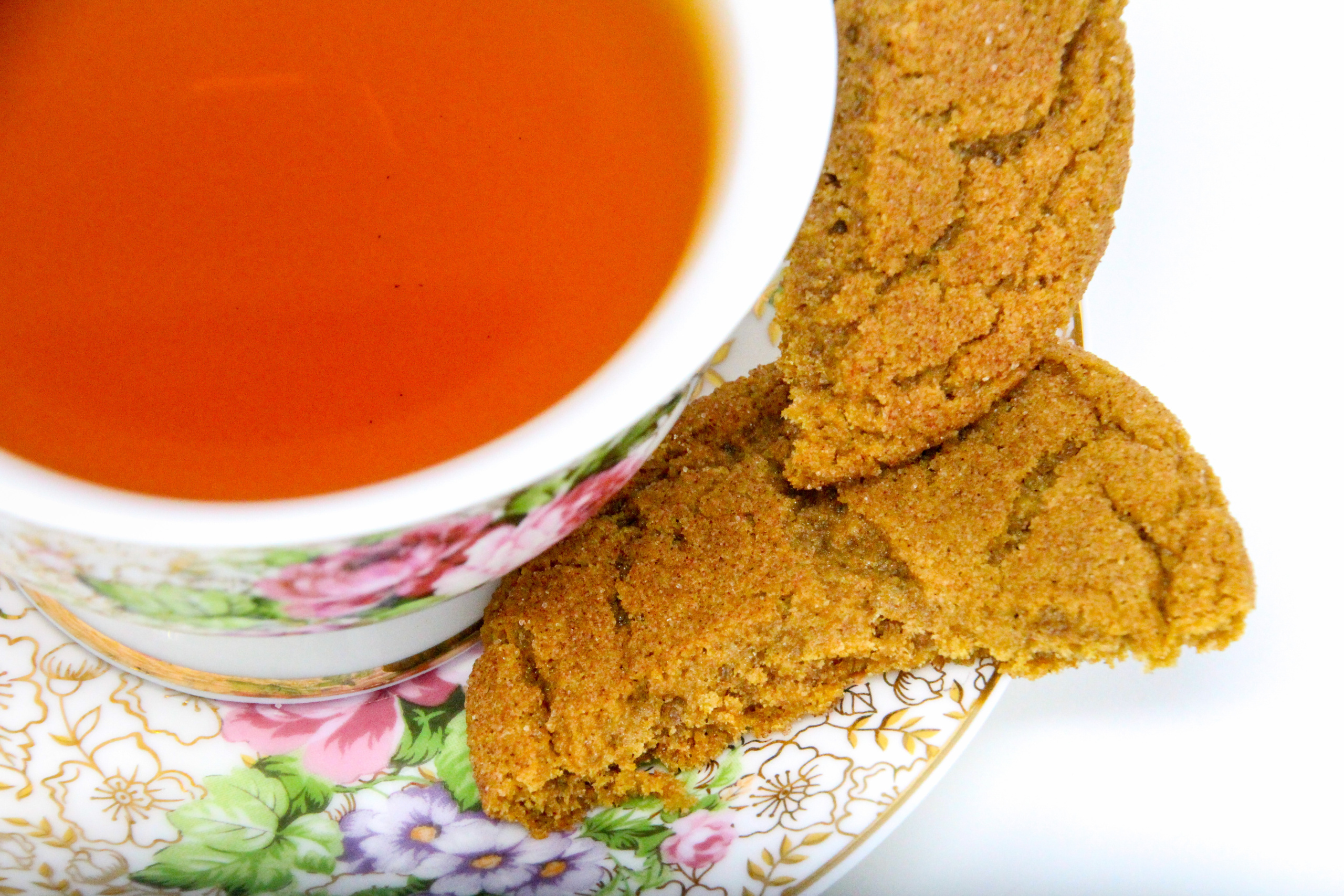 With plenty of warming spices to make taste buds sing, these gingersnap cookies are crispy around the edges and soft and chewy in the middle... perfection! Recipe shared with permission granted by Michelle Hillen Klump, author of A DASH OF DEATH. 