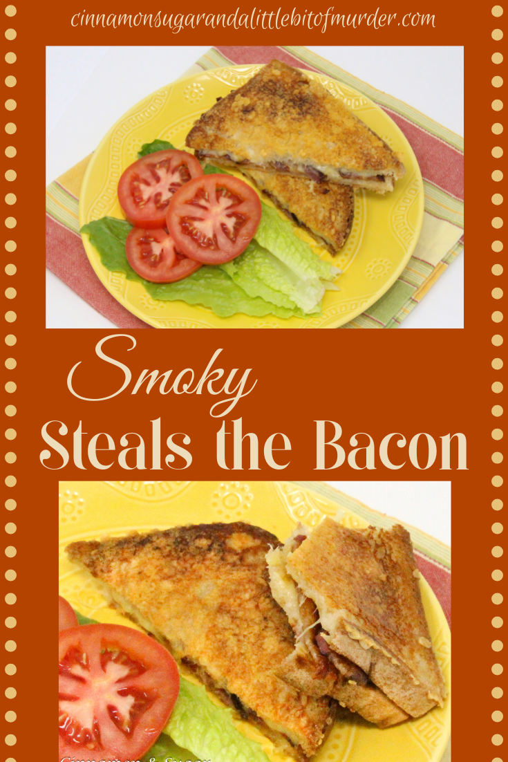 Smoky Steals the Bacon grilled cheese sandwich features bacon cradled by smoked gouda oozing between the slices of asiago bread. With the addition parmesan cheese sprinkled in the pan before grilling the bread, this sandwich is heavenly! Recipe shared with permission granted by Linda Reilly, author of UP TO NO GOUDA. 