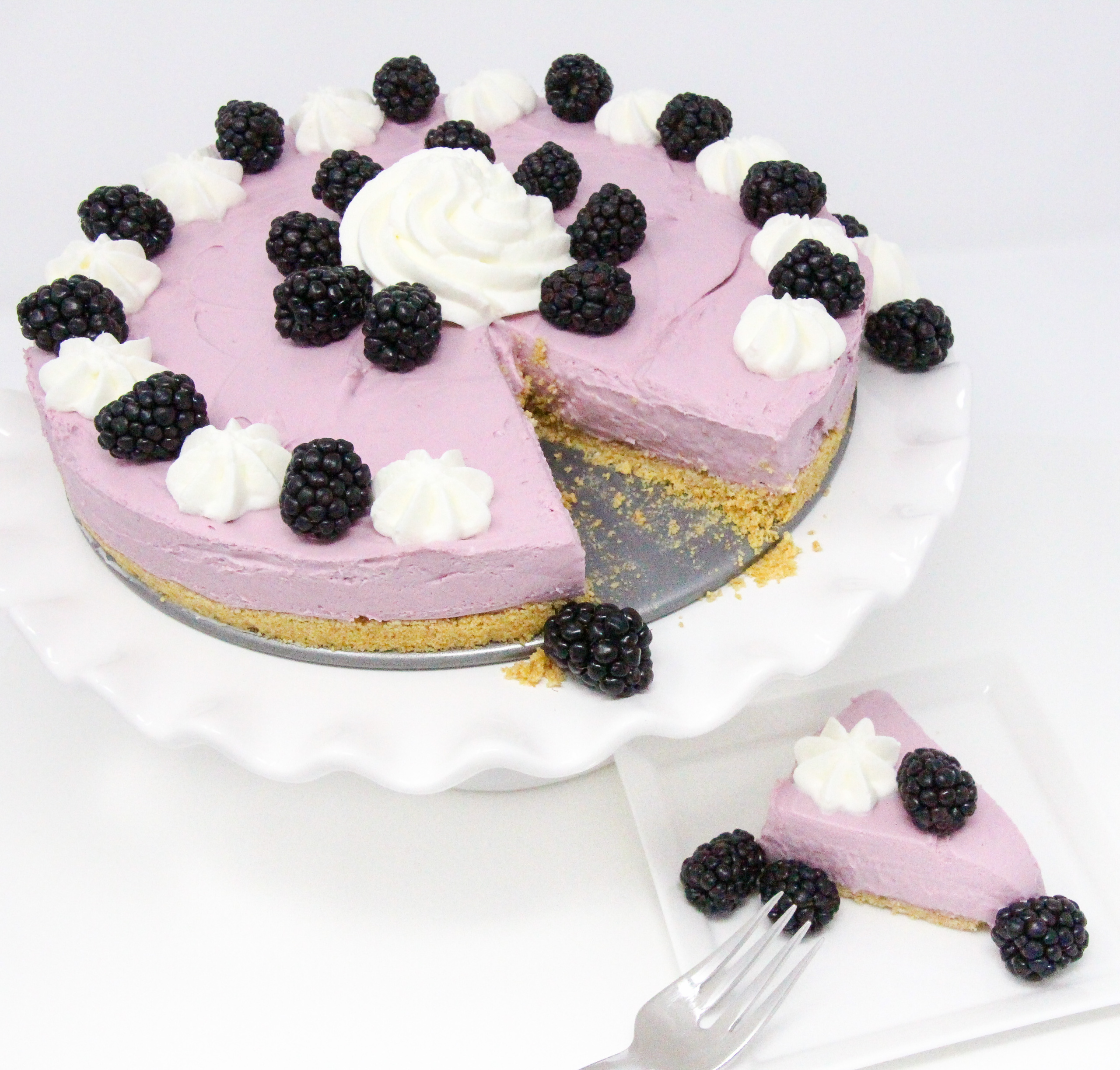 Perfect for hot summer weather, Blackberry No-Bake Cheesecake has a creamy, rich flavor without turning on the oven! Recipe shared with permission granted by Krista Davis, author of THE DIVA SAYS CHEESECAKE. 