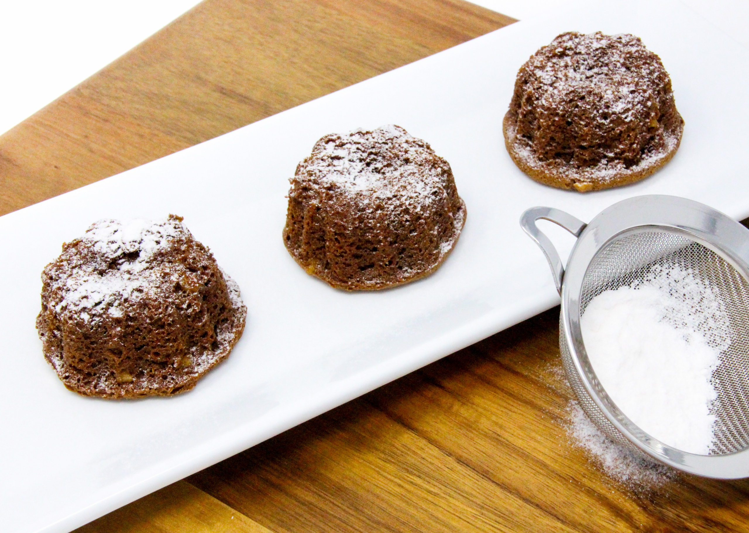 Easy to mix up and with a depth of flavor provided by crystallized ginger, Old-Fashioned Gingerbread is a delicious treat! Recipe shared with permission granted by Ellen Byron, author of BAYOU BOOK THIEF. 