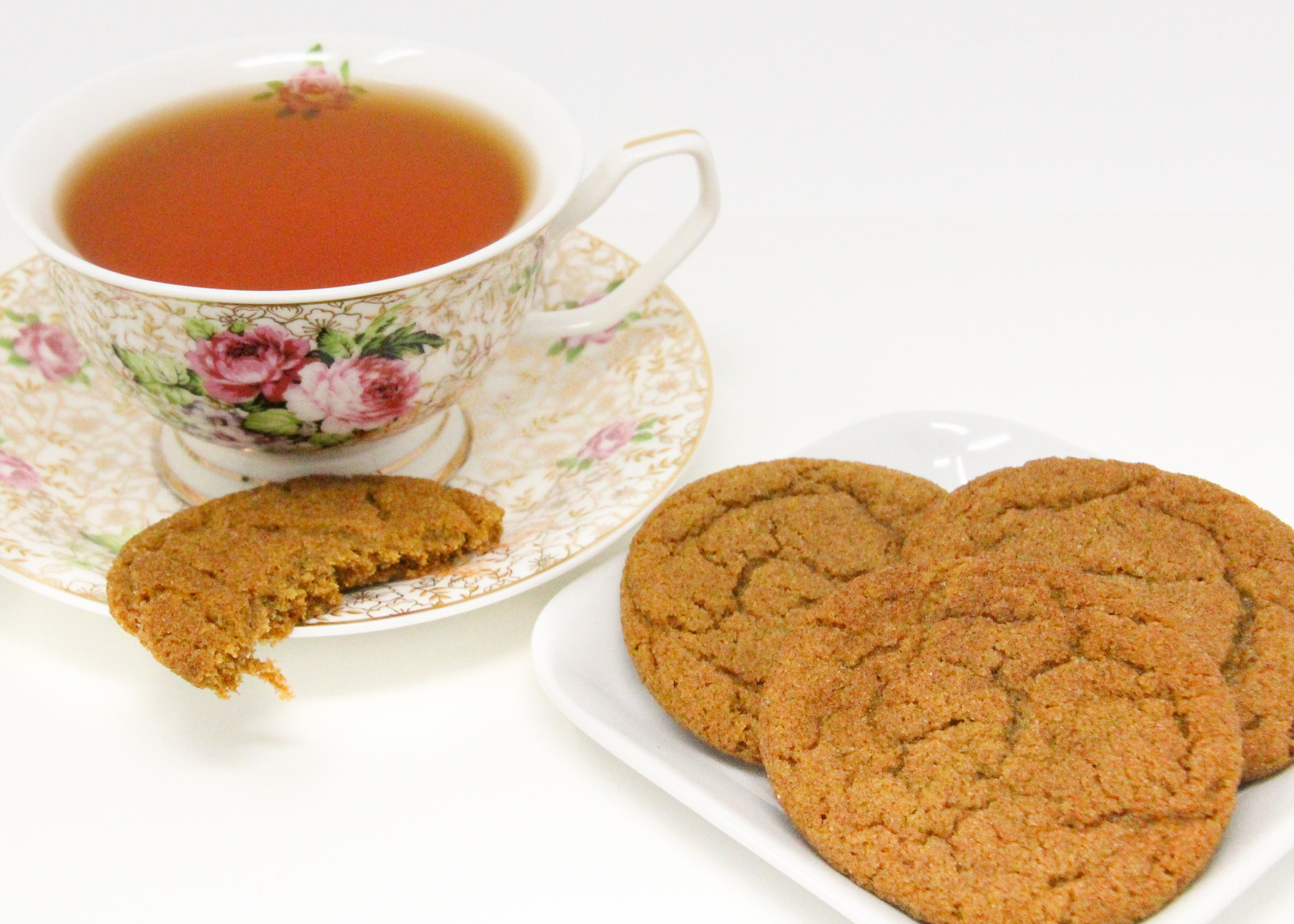 With plenty of warming spices to make taste buds sing, these gingersnap cookies are crispy around the edges and soft and chewy in the middle... perfection! Recipe shared with permission granted by Michelle Hillen Klump, author of A DASH OF DEATH. 