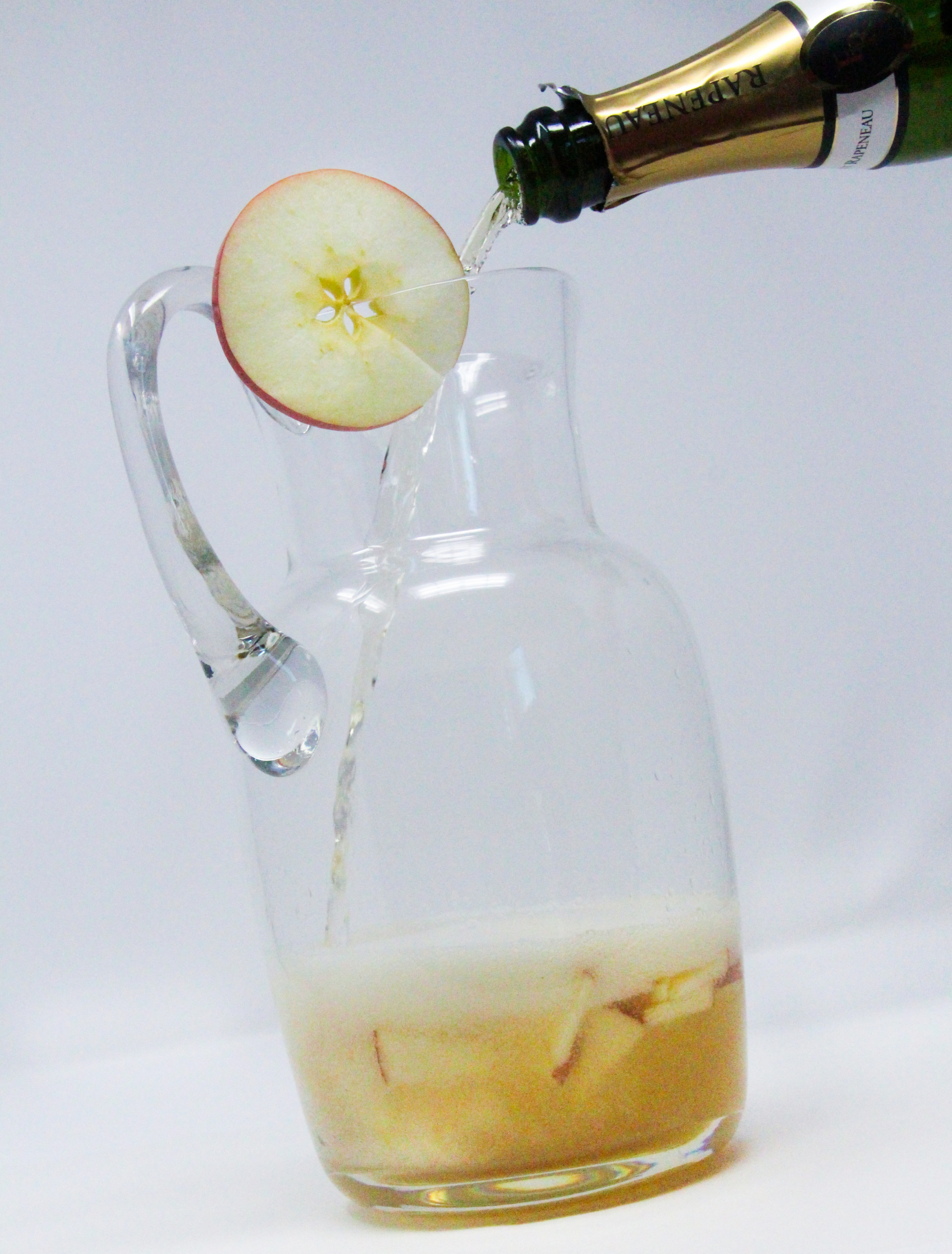 With sparkling white wine for bubbly fun, pear juice for sweetness, and honeyed whiskey along with pear liqueur for kick, this delicious libation brings to mind parties, summertime poolside relaxation, or a delightful drink to share with friends! Recipe shared with permission granted by Sarah E. Burr, author of #FollowMe for Murder