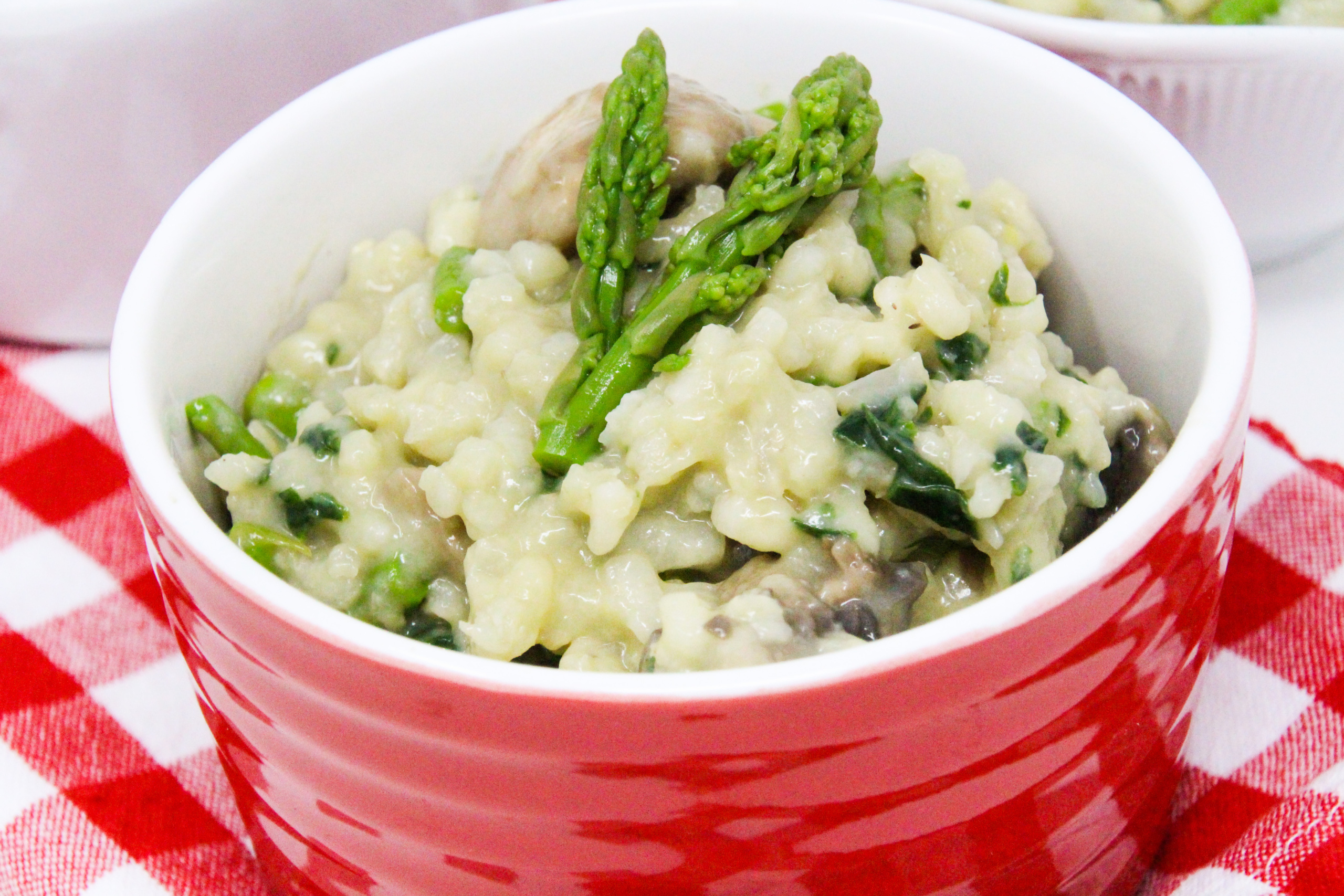 Workday Quick and Easy Risotto has lots of vegetables to complement the creamy Arborio rice. Perfect as both a side dish or serve as a main course. Recipe shared with permission granted by Lynn Cahoon, author of A FATAL FAMILY FEAST. 