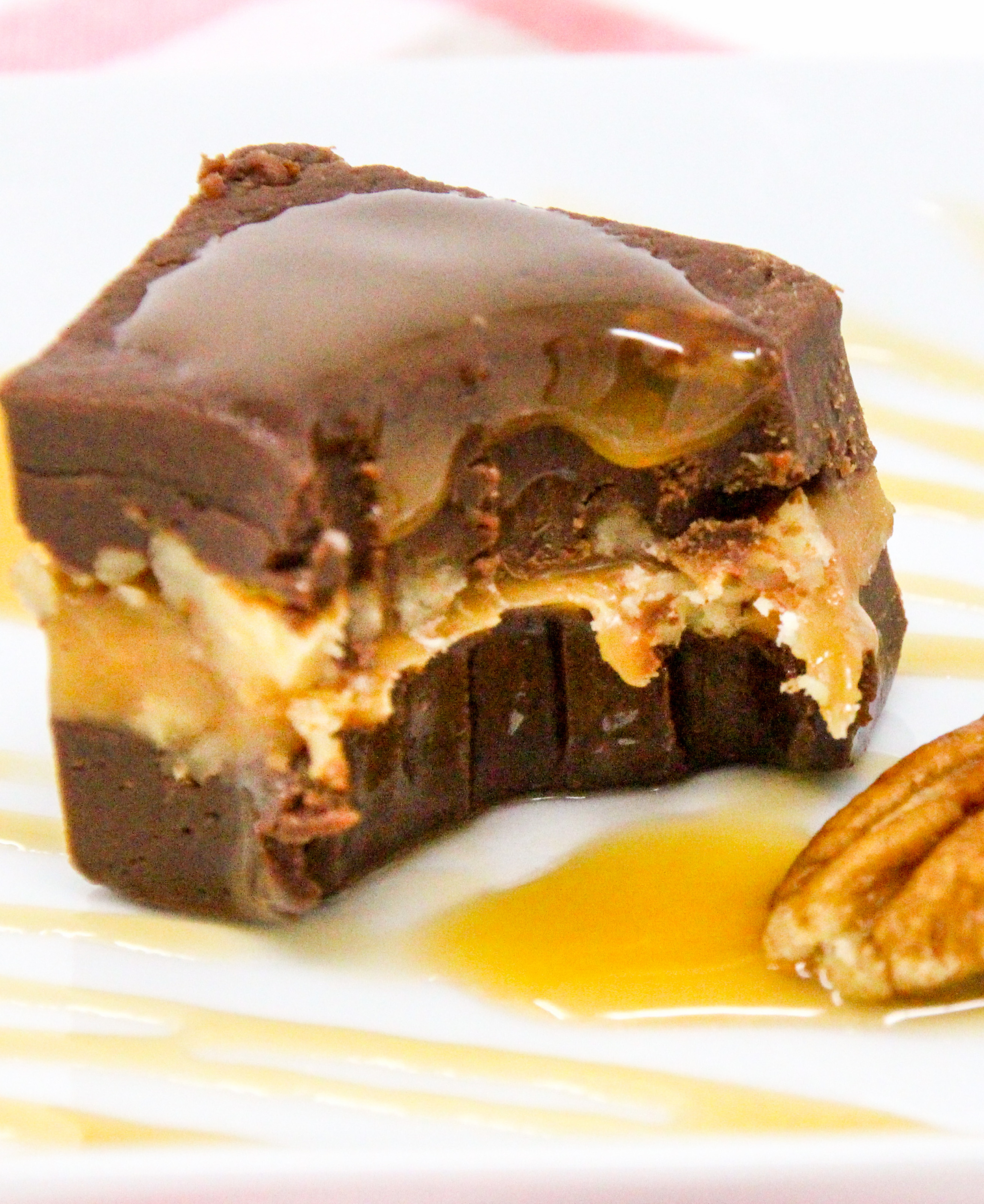 Turtle Fudge utilizes pantry-stable items like caramel pieces, chocolate chips, and sweetened condensed milk yet the resulting treat is candy shop worthy! Recipe shared with permission granted by Nancy Coco, author of A Midsummer Night's Fudge. 