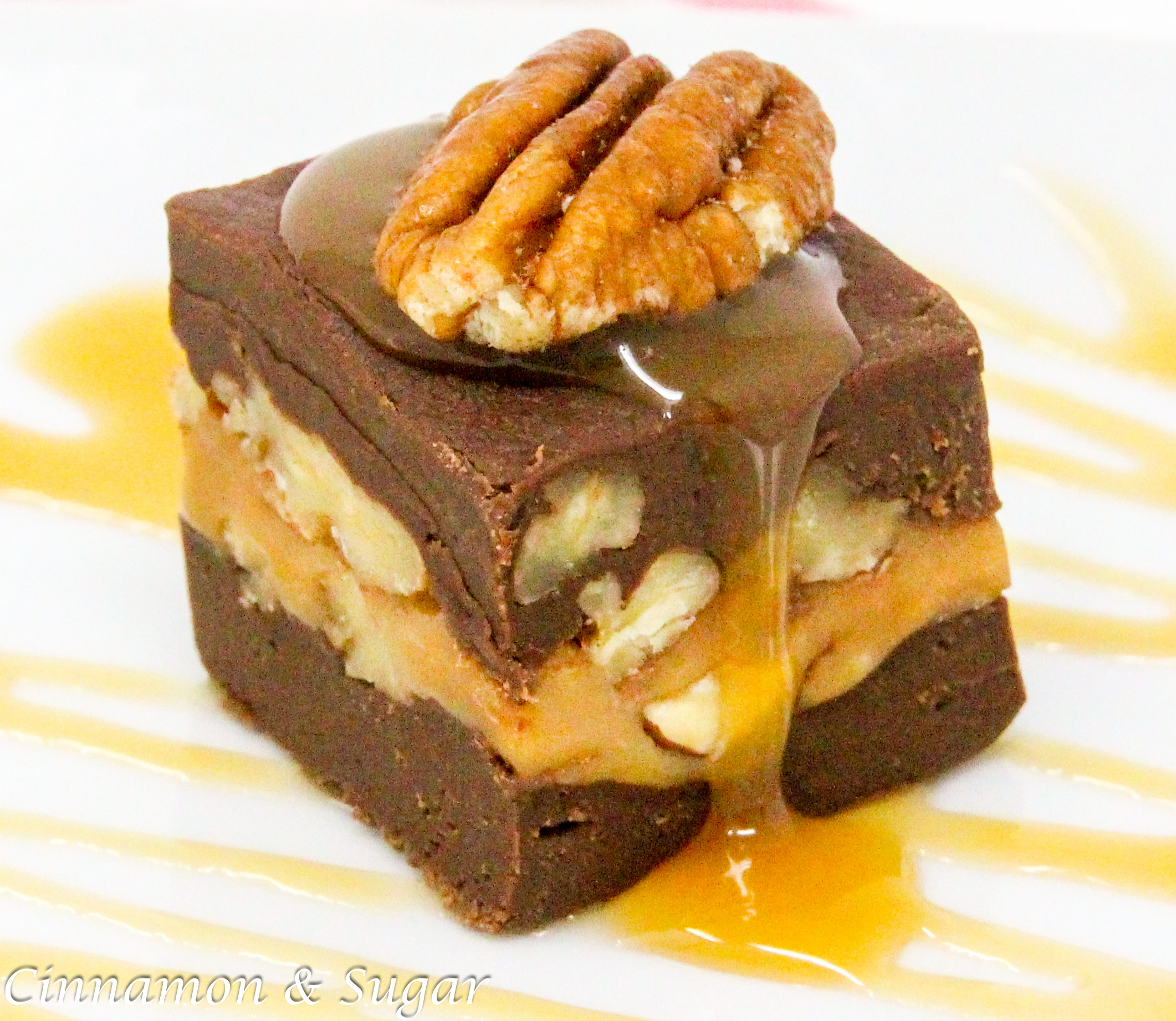 Turtle Fudge utilizes pantry-stable items like caramel pieces, chocolate chips, and sweetened condensed milk yet the resulting treat is candy shop worthy! Recipe shared with permission granted by Nancy Coco, author of A Midsummer Night's Fudge. 