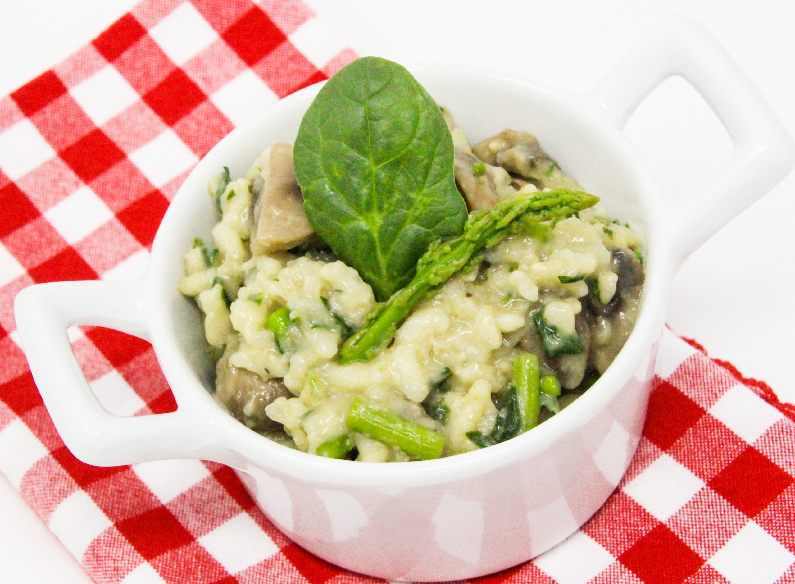 Workday Quick and Easy Risotto has lots of vegetables to complement the creamy Arborio rice. Perfect as both a side dish or serve as a main course. Recipe shared with permission granted by Lynn Cahoon, author of A FATAL FAMILY FEAST. 