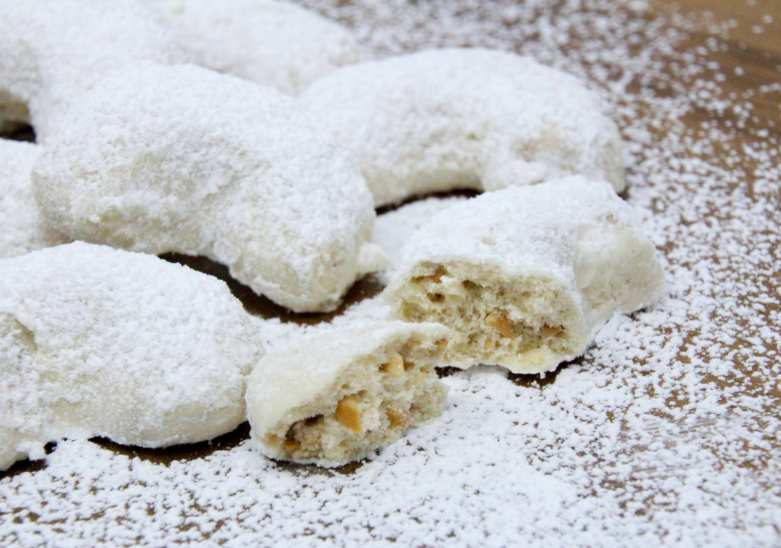 Katie’s Wedding Cookies are easy to mix up and the mild, crunchy cashews complements the flaky cookie base. The cookie itself isn’t overly sweet, so the extra coating of confectioners’ sugar provides the perfect balance. Recipe shared with permission granted by Daryl Wood Gerber, author of SIMMERING WITH RESENTMENT. 