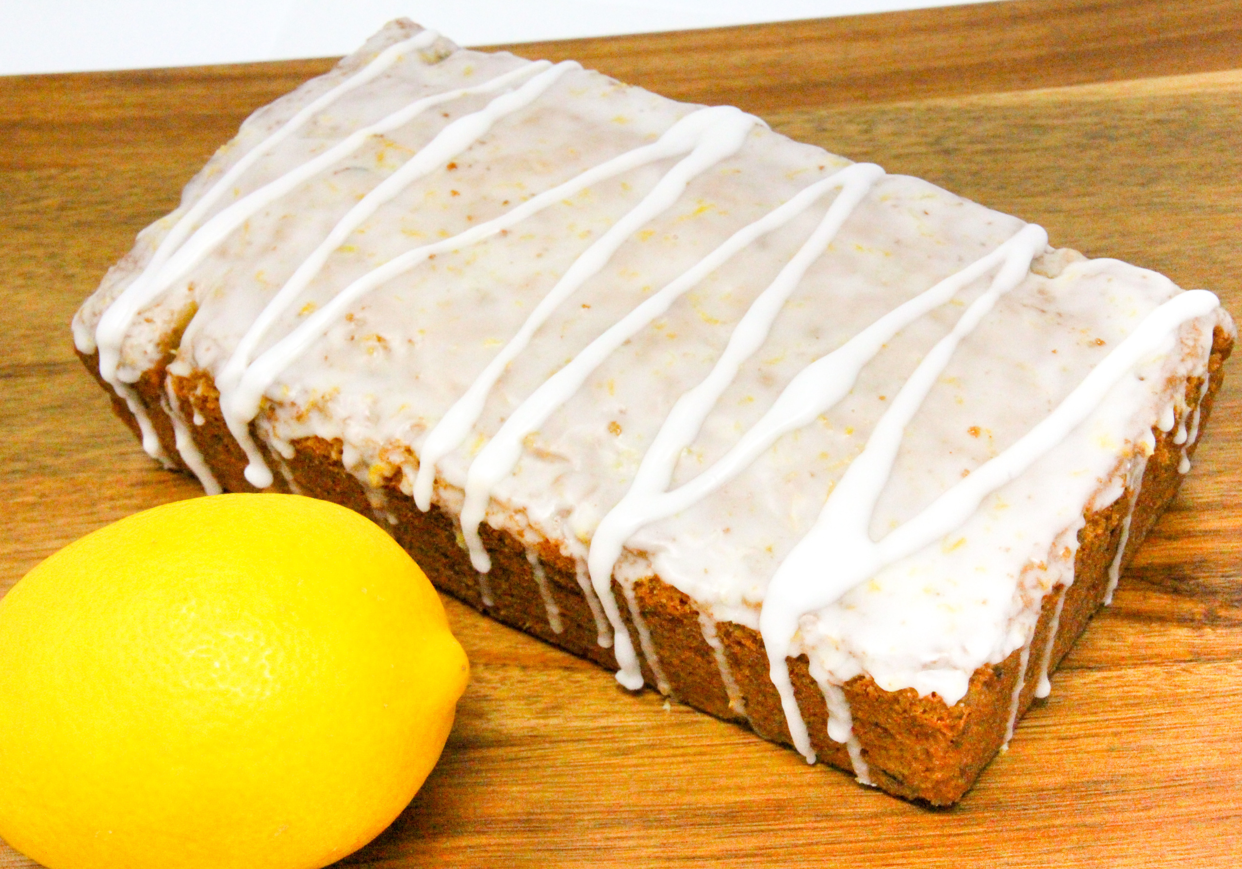 Lemon Zucchini Bread is simple to make. The lemon juice gives it a lighter flavor and the lemony glaze makes it taste indulgent. Recipe shared with permission granted by Valerie Burns, author of TWO PARTS SUGAR, ONE PART MURDER.