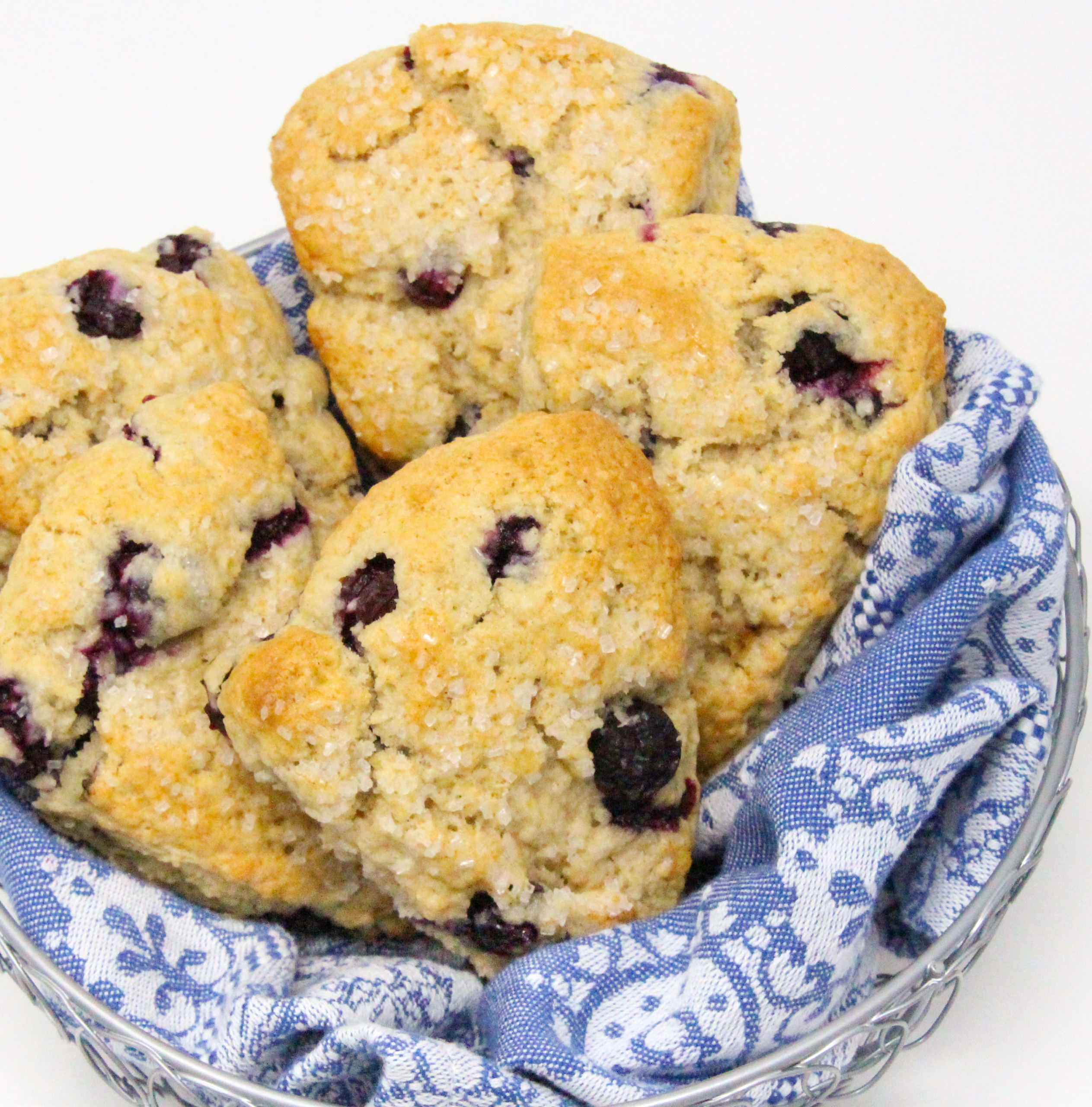 Flaky, rich, and with the yummy sweetness of the blueberries, these Blueberry Scones can be made year-round thanks to being able to use either fresh or frozen blueberries, depending on the season. Recipe shared with permission granted by Maddie Day, author of MURDER IN A CAPE COTTAGE. 