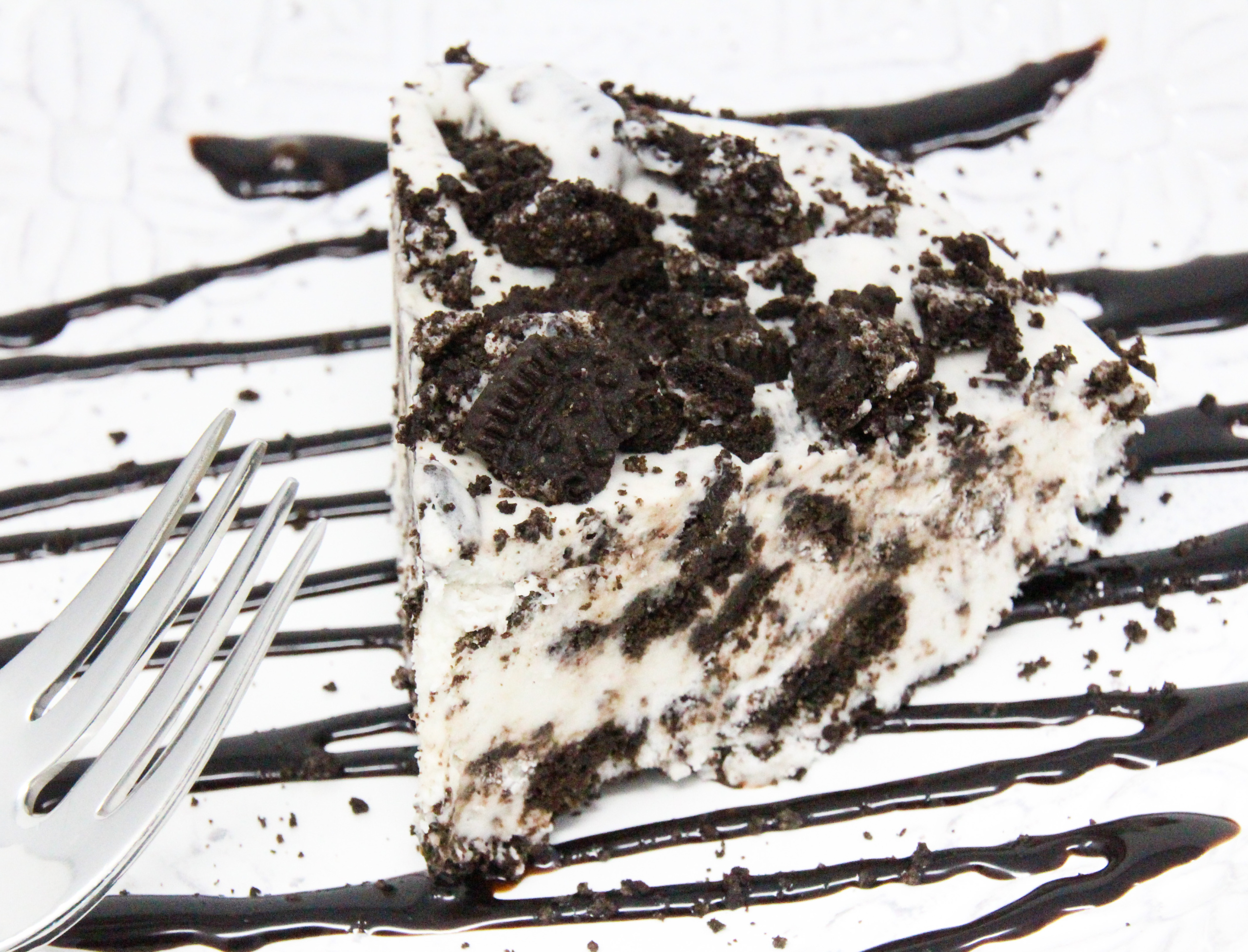 Gramma's Easy Oreo Ice Cream uses only four simple ingredients and an electric mixer. Once frozen, the resulting concoction is pure deliciousness! Recipe shared with permission granted by Lee Hollis, author of DEATH OF AN ICE CREAM SCOOPER. 