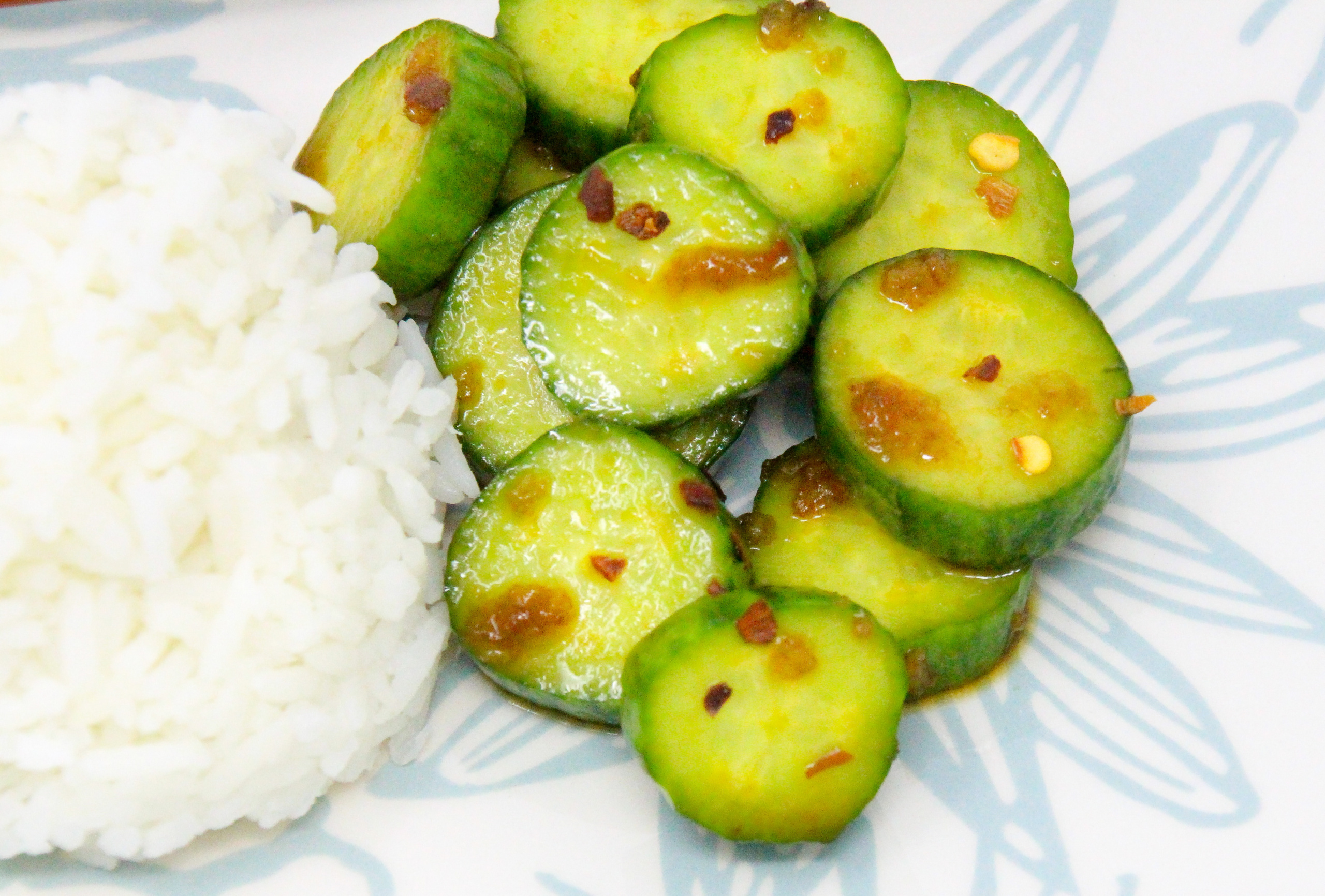 Tangy and a touch of heat, Spicy Cucumber Salad makes a great accompaniment to any roasted or sautéed meat entrée or whenever you want a refreshing way to showcase your bountiful garden harvest of cucumbers. Recipe shared with permission granted by Jennifer J. Chow, author of DEATH BY BUBBLE TEA. 