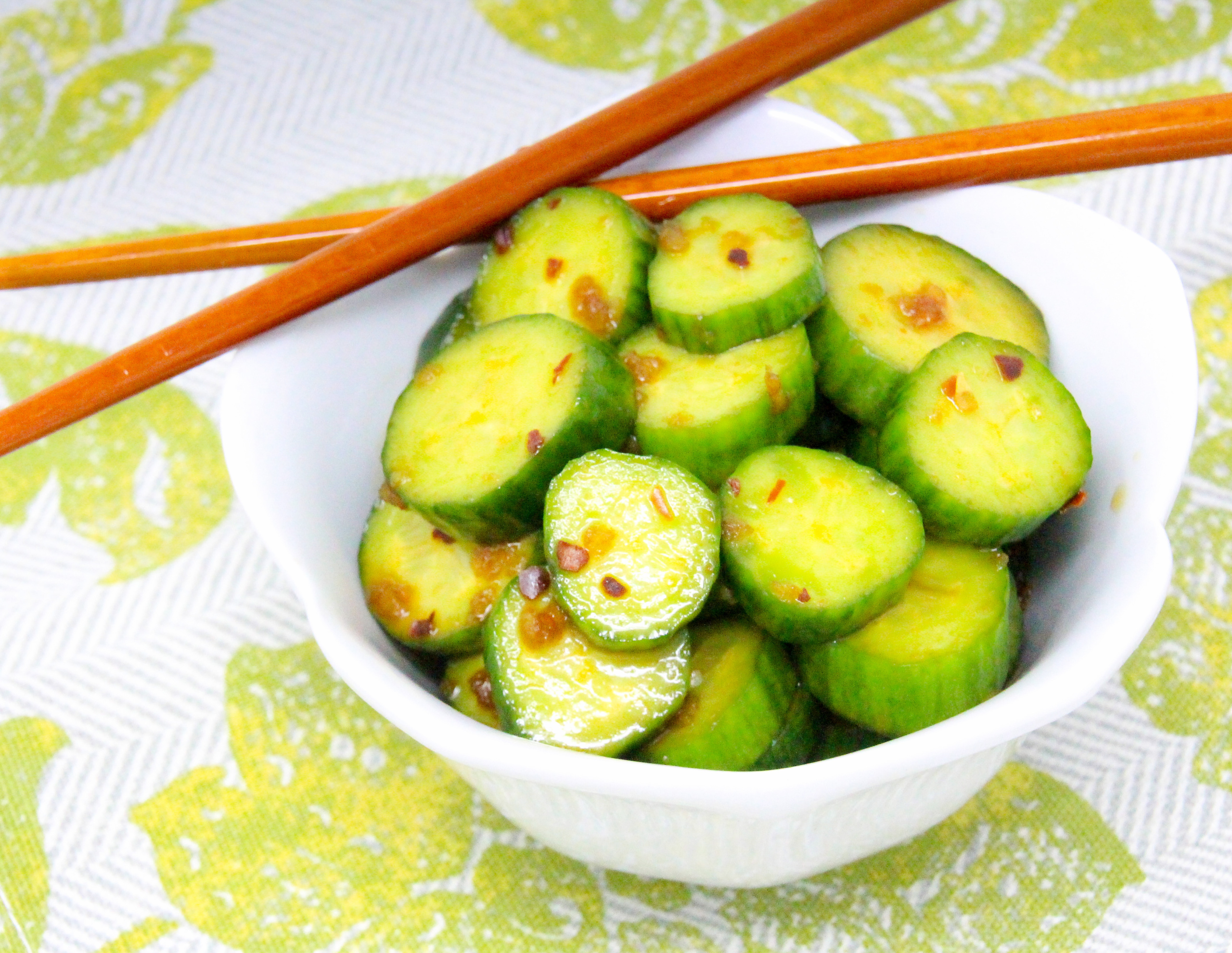 Tangy and a touch of heat, Spicy Cucumber Salad makes a great accompaniment to any roasted or sautéed meat entrée or whenever you want a refreshing way to showcase your bountiful garden harvest of cucumbers. Recipe shared with permission granted by Jennifer J. Chow, author of DEATH BY BUBBLE TEA. 