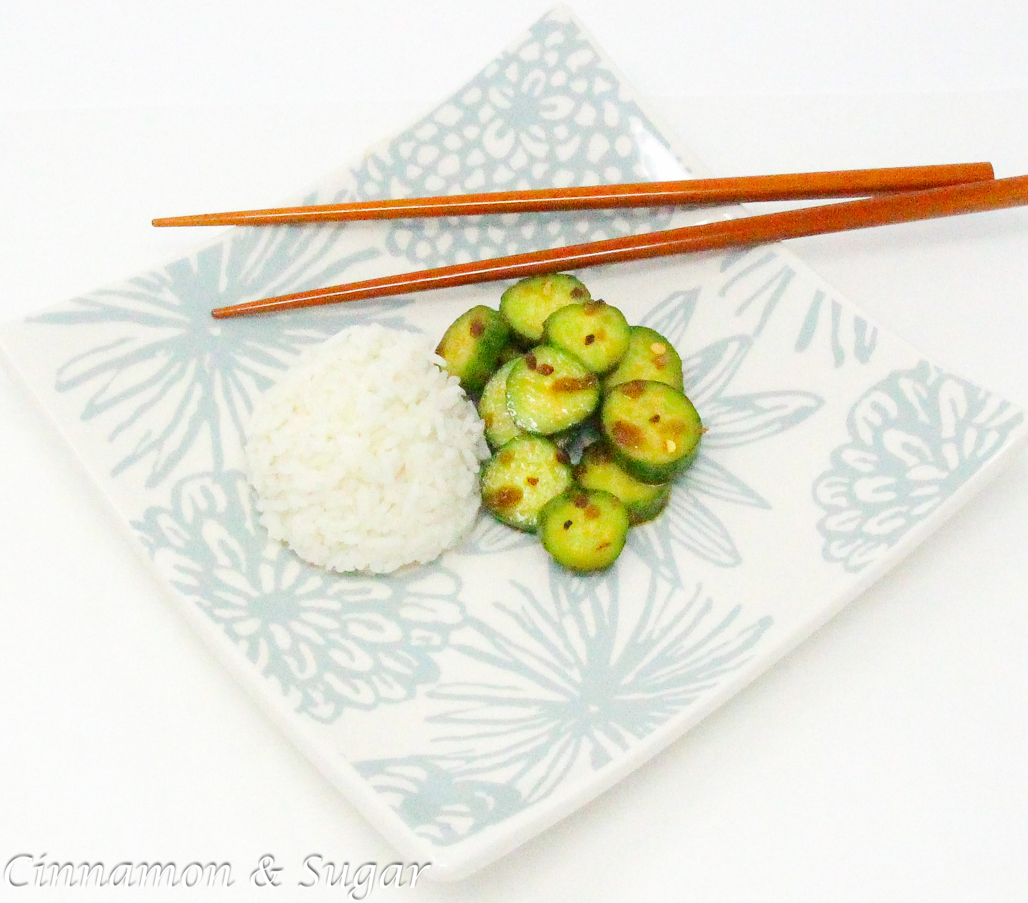 Tangy and a touch of heat, Spicy Cucumber Salad makes a great accompaniment to any roasted or sautéed meat entrée or whenever you want a refreshing way to showcase your bountiful garden harvest of cucumbers. Recipe shared with permission granted by Jennifer J. Chow, author of DEATH BY BUBBLE TEA. 