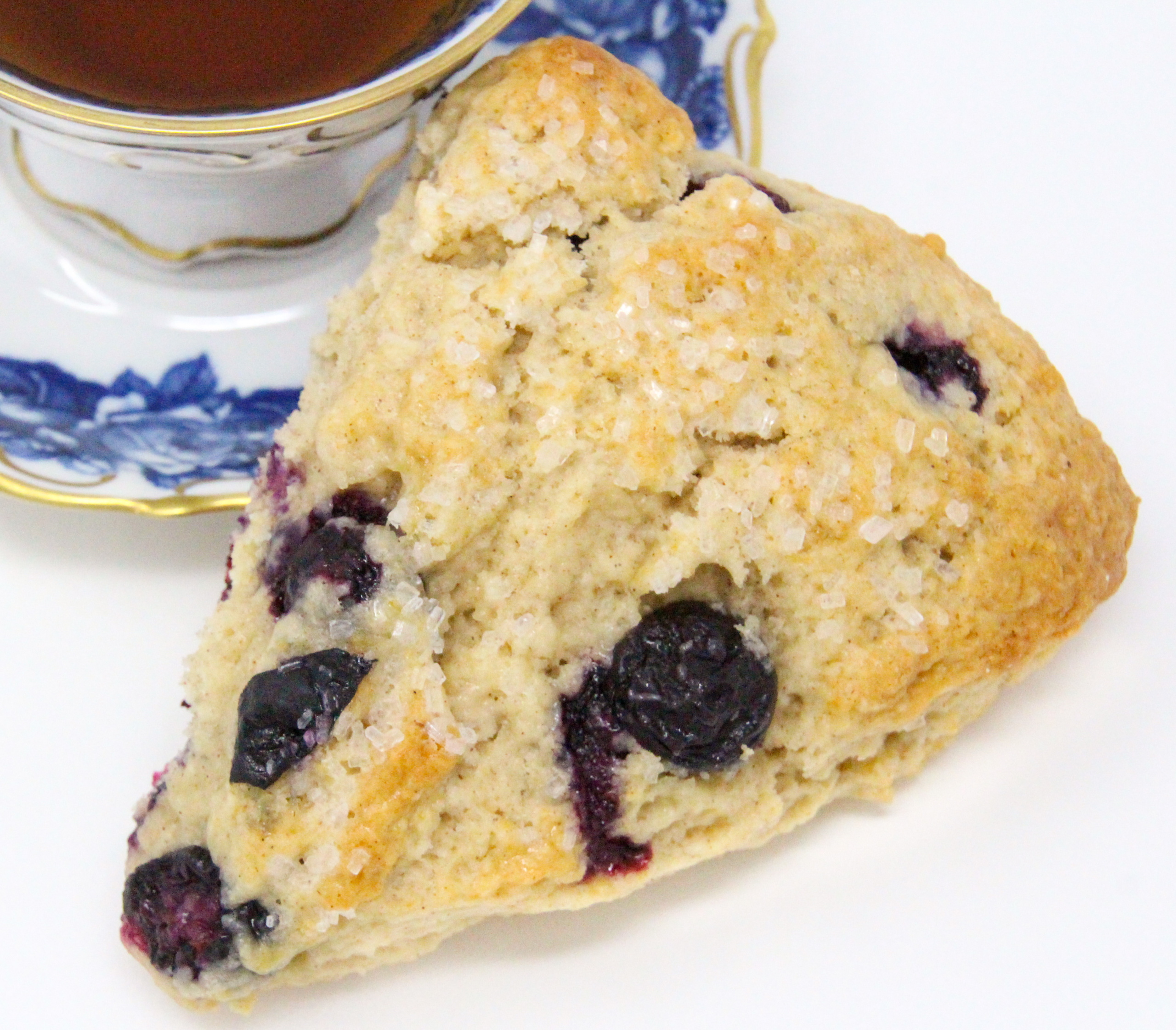 Flaky, rich, and with the yummy sweetness of the blueberries, these Blueberry Scones can be made year-round thanks to being able to use either fresh or frozen blueberries, depending on the season. Recipe shared with permission granted by Maddie Day, author of MURDER IN A CAPE COTTAGE. 