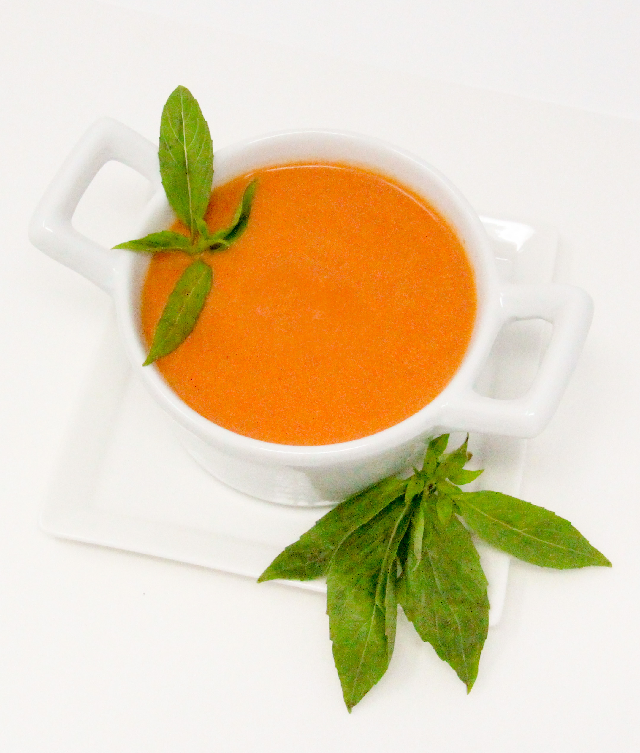 Grant's Tomato Soup uses canned San Marzano tomatoes, plus the addition of other fresh ingredients and sherry which elevates the flavor to yum. With a bit a cream, the added richness complements the tang of cheese in a grilled cheese sandwich. Recipe shared with permission granted by Linda Reilly, author of CHEDDER LATE THAN DEAD. 