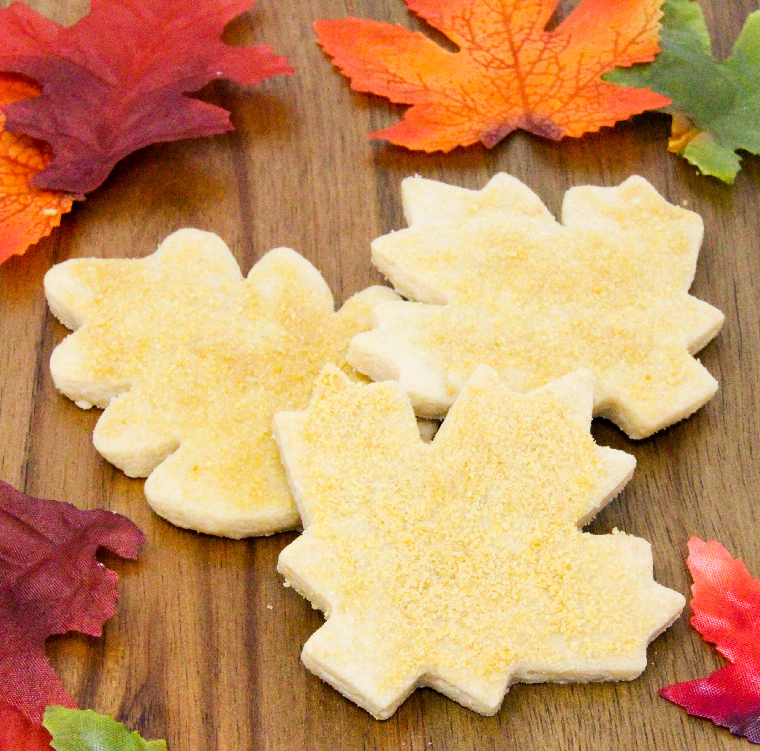 Sweetened with maple sugar and brown sugar, Maple Shortbread Cookies are flaky and tender, and evoke the flavor of autumn. Recipe created by Cinnamon & Sugar for Catherine Bruns, author of A DOOMFUL OF MURDER. 