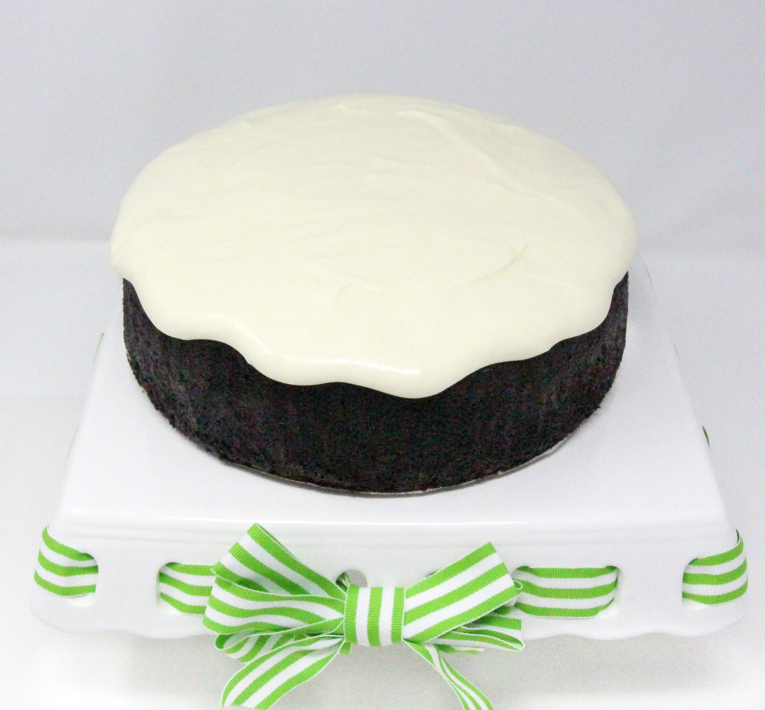 Ultra chocolaty, Chocolate Guinness Cake is moist and rich, thanks to a generous measure of cocoa, Guinness, and sour cream. Topped with tangy cream cheese frosting elevates the dessert to pure deliciousness. Recipe shared with permission granted by Carlene O'Connor, author of MURDER AT AN IRISH BAKERY. 
