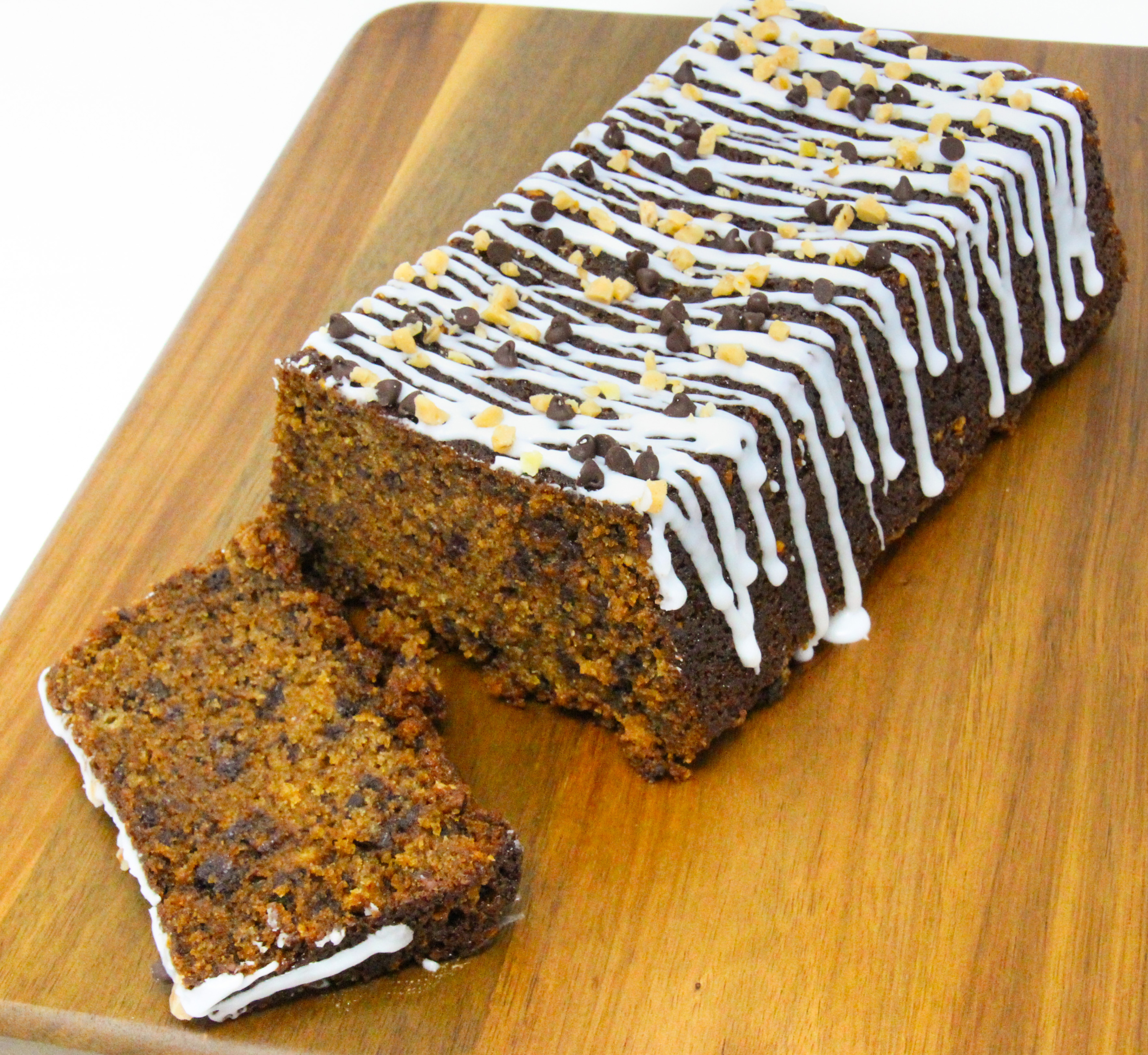 Banoffee Banana Bread combines bananas, caramel, chocolate, and toffee bits all wrapped up in a tender loaf. This utterly delicious bread is perfect for breakfast, snack time, or even dessert! Recipe shared with permission granted by Amber Royer, author of A STUDY IN CHOCOLATE. 