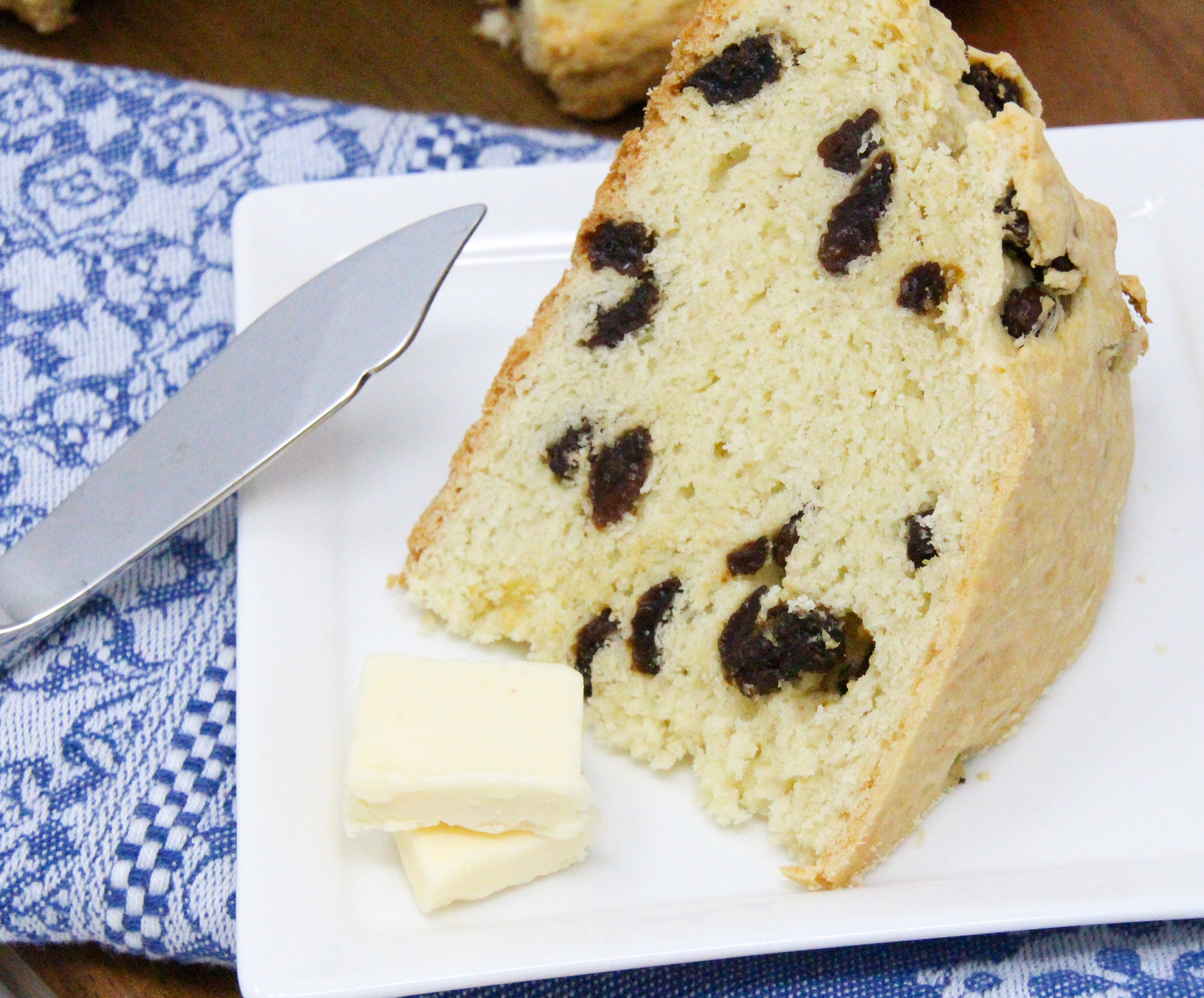 Delicious and easy to make, this Irish Soda Bread comes together quickly using only one-bowl. Toasted and slathered with butter or served with a bowl of soup, this Irish treat is perfect any time of the year. Recipe shared with permission granted by Barbara Ross, author of Irish Coffee Murder. 
