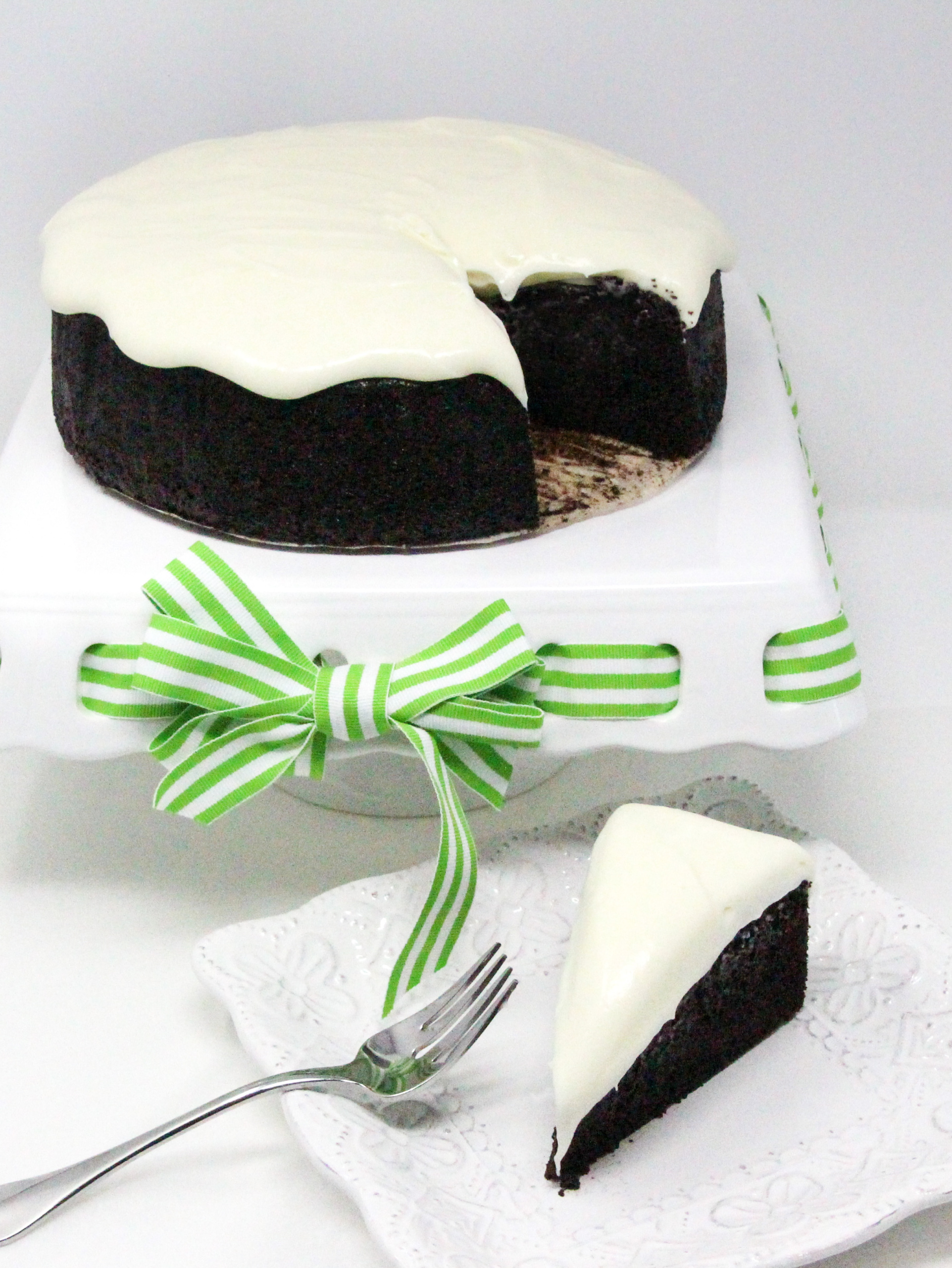 Ultra chocolaty, Chocolate Guinness Cake is moist and rich, thanks to a generous measure of cocoa, Guinness, and sour cream. Topped with tangy cream cheese frosting elevates the dessert to pure deliciousness. Recipe shared with permission granted by Carlene O'Connor, author of MURDER AT AN IRISH BAKERY. 