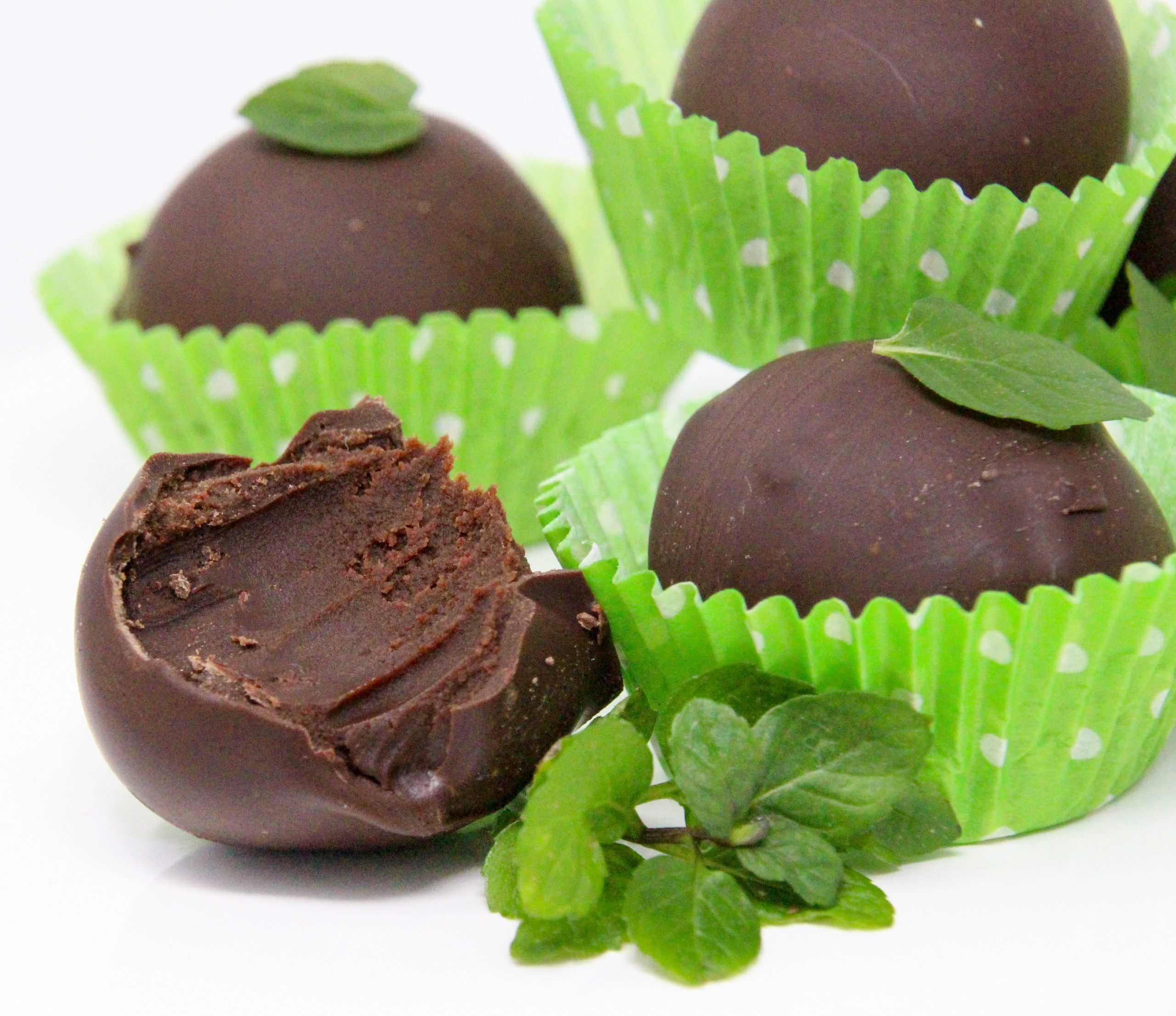 Mint Melty Truffles are delicately mint-flavored, melt-in-your-mouth, candies. With filling encased in a generous portion of dark chocolate, these treats make for a perfect gift or a special way to spoil yourself! Recipe shared with permission granted by Sarah Fox, author of Six Sweets Under. 