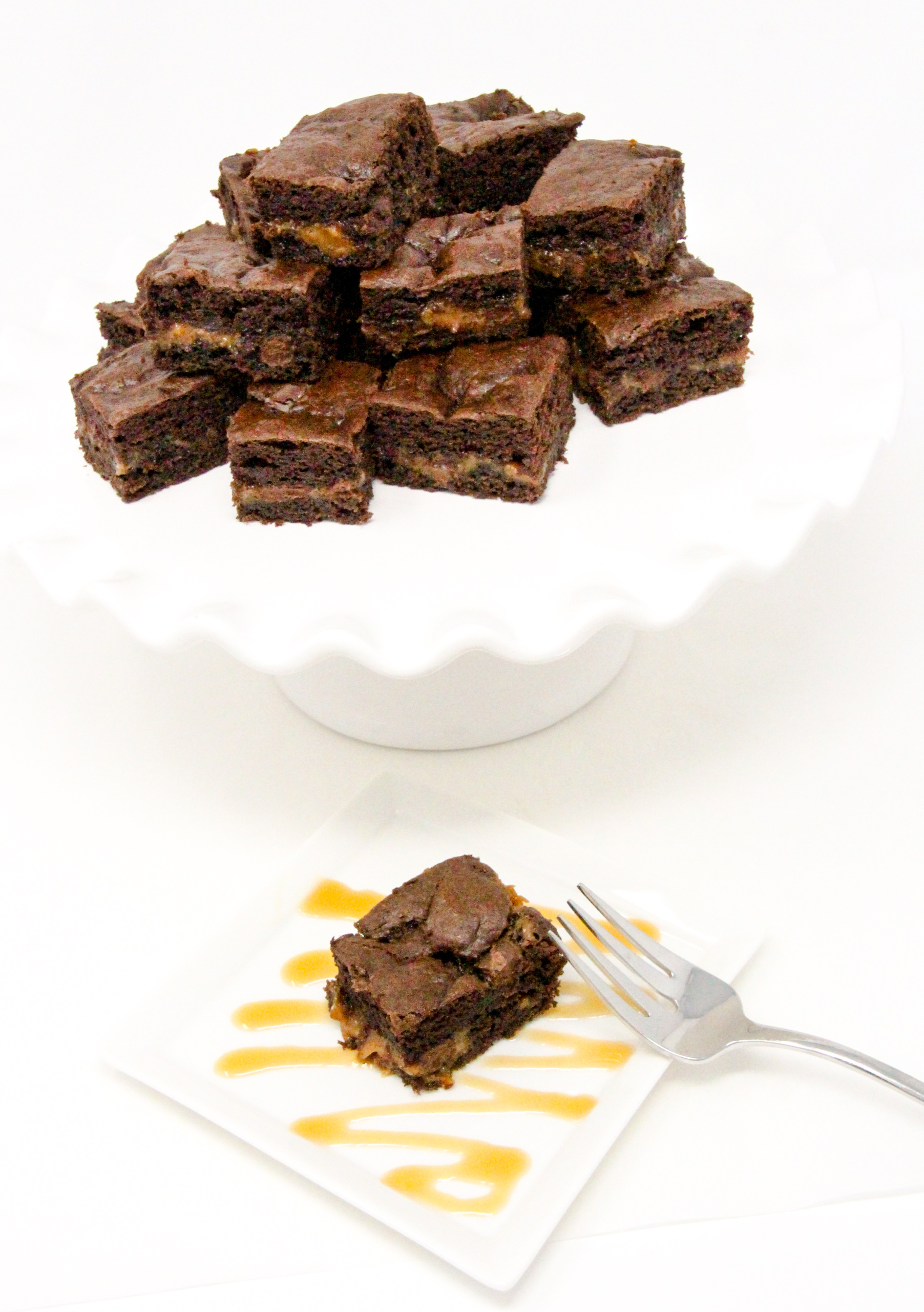 Double-Chocolate Caramel Brownies are the perfect combination of rich chocolaty goodness combined with creamy caramel that elevates these to pure deliciousness. And starting with a boxed cake mix, these are a cinch to make. Recipe shared with permission granted by Daryl Wood Gerber, author of A FLICKER OF A DOUBT. 