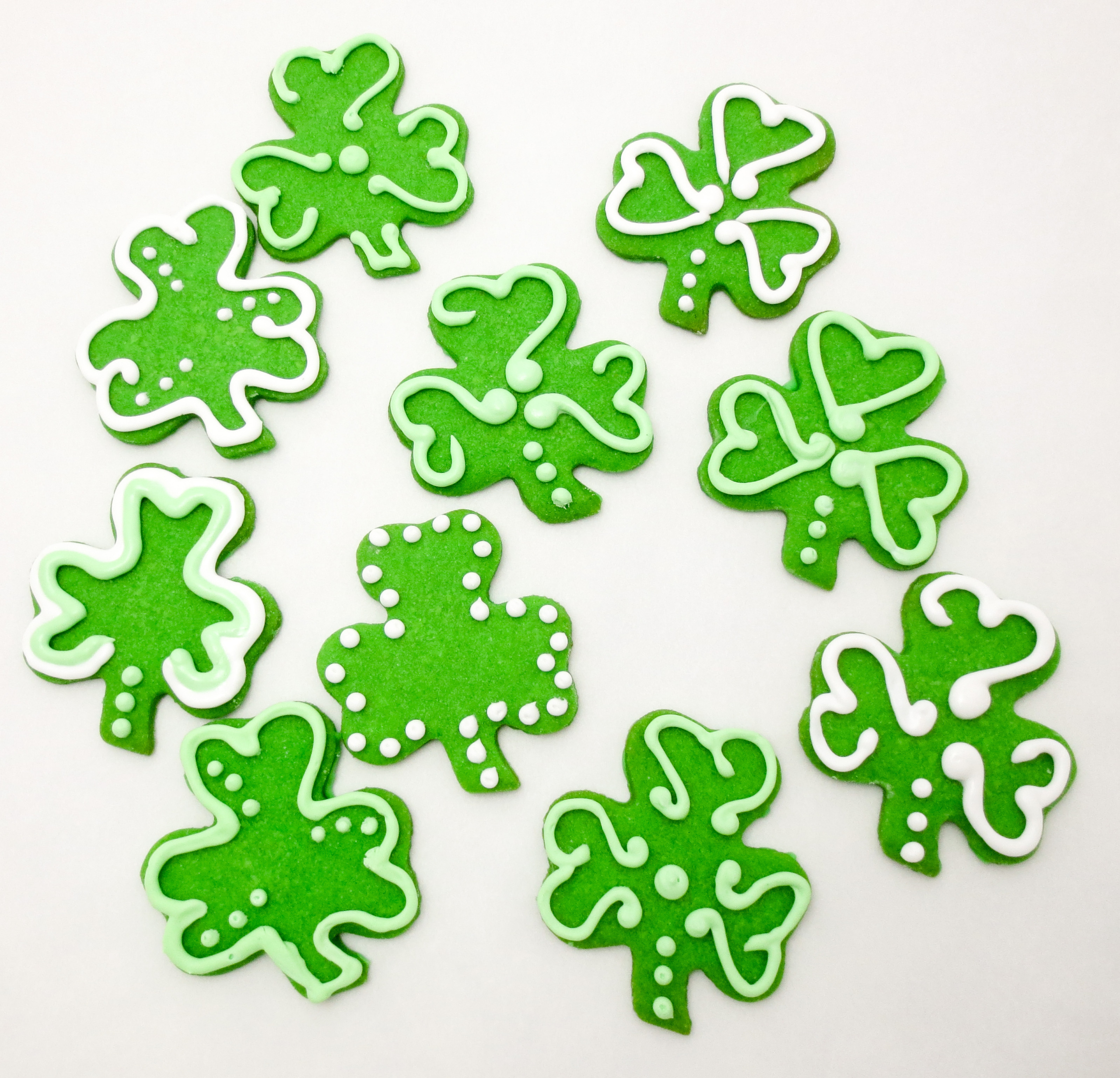 Shamrock cookies are mint-flavored sugar cookies decorated with royal icing (and/or sprinkles) in the quintessential St. Patrick’s Day shape. They are sure to bring a smile and good luck to everyone you share them with! Recipe developed by Cinnamon & Sugar for Deborah Garner, author of A FLAIR FOR SHAMROCKS. 