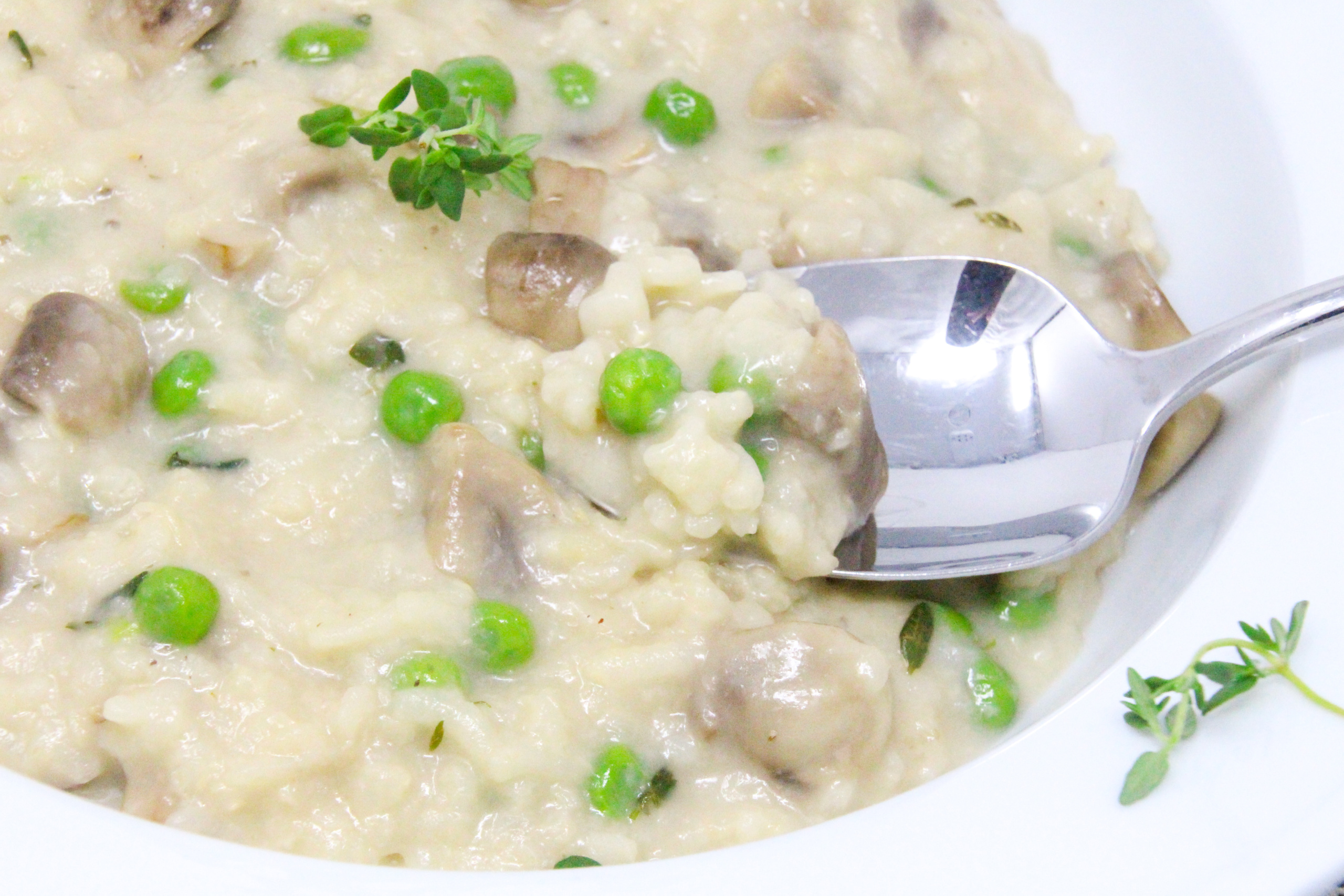 Risotto with Chanterelles and Peas is a delicious combination of flavors! While risotto can be labor intensive, the author offers some tips for prepping ahead of time, then finishing the dish ten minutes before dinner. Recipe shared with permission granted by Leslie Karst, author of A SENSE FOR MURDER. 