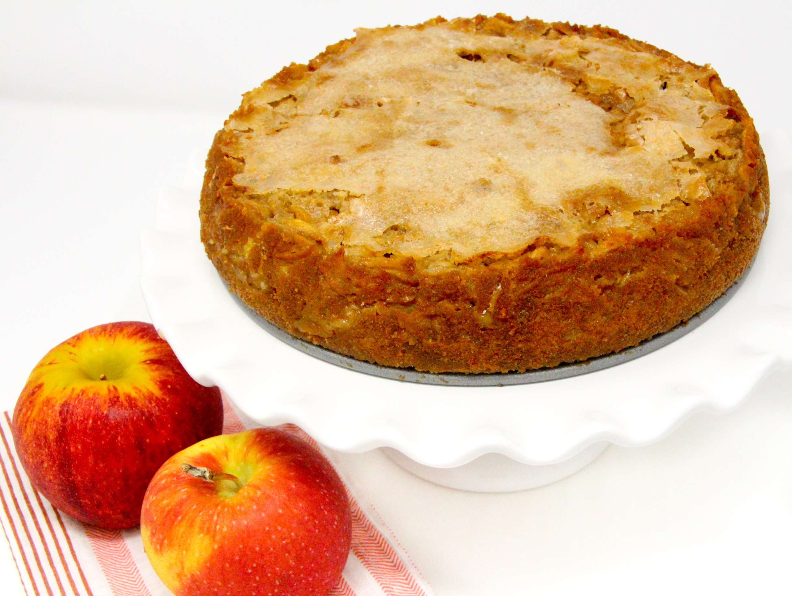 Cayenne’s Five Spice French Apple Custard Cake is super moist, super flavorful, and super delicious thanks to an abundance of apples and Chinese Five Spice. Recipe shared with permission granted by Leslie Budewitz, author of BETWEEN A WOK AND A DEAD PLACE. 