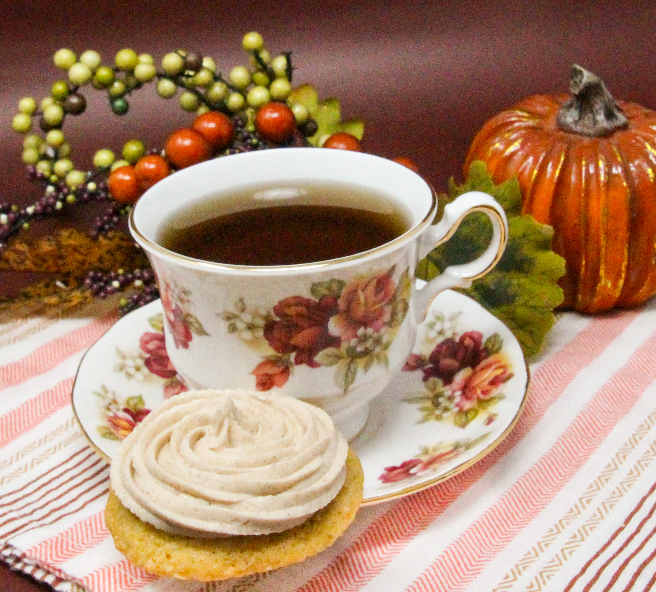 Fabulous Frosted Pumpkin Sugar Cookies are soft on the inside, a bit crunchy on the outside, and are delicious all on their own. But it’s the addition of the cinnamon-flavored frosting that makes these an extra-special treat! Recipe shared with permission granted by Darci Hannah, author of MURDER AT THE PUMPKIN PAGEANT. 